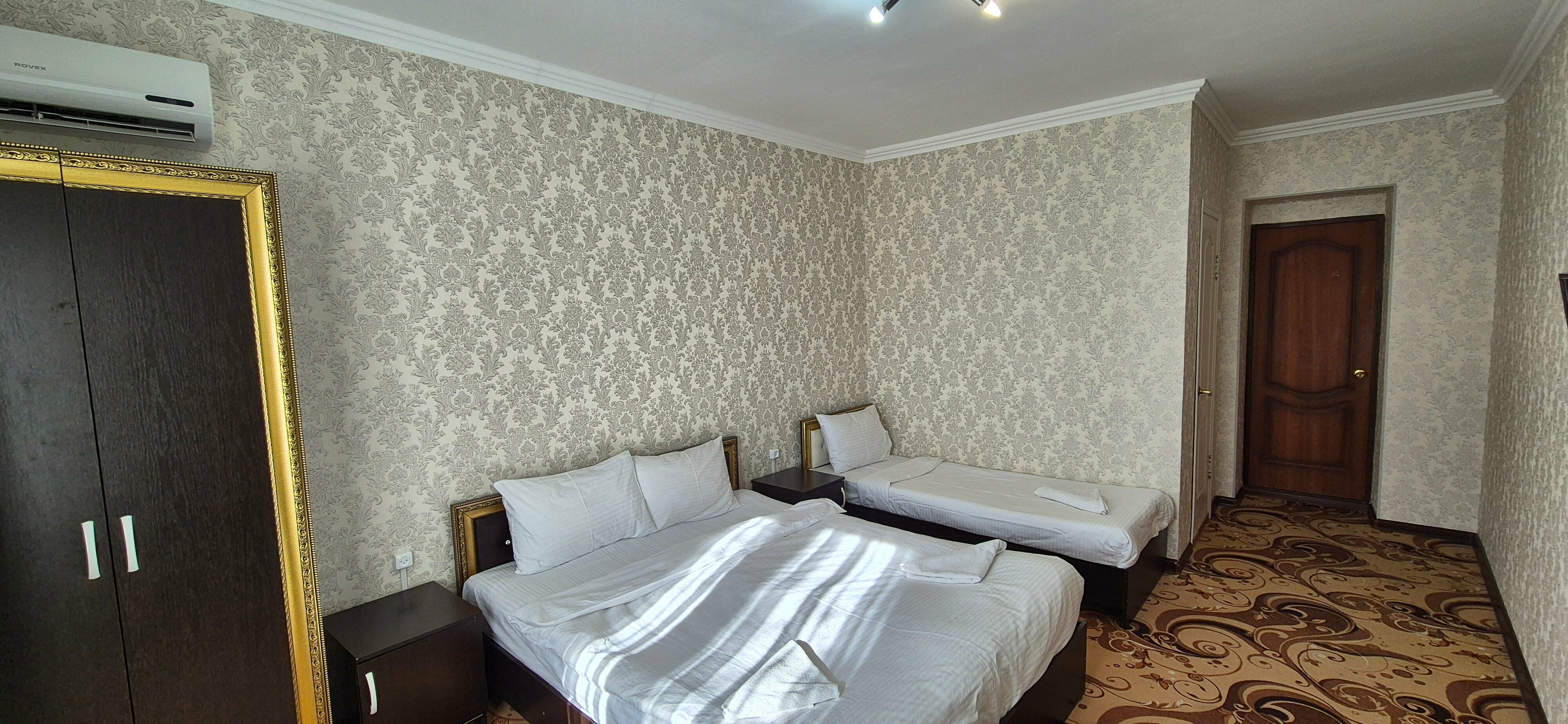 Трехместный номер с балконом