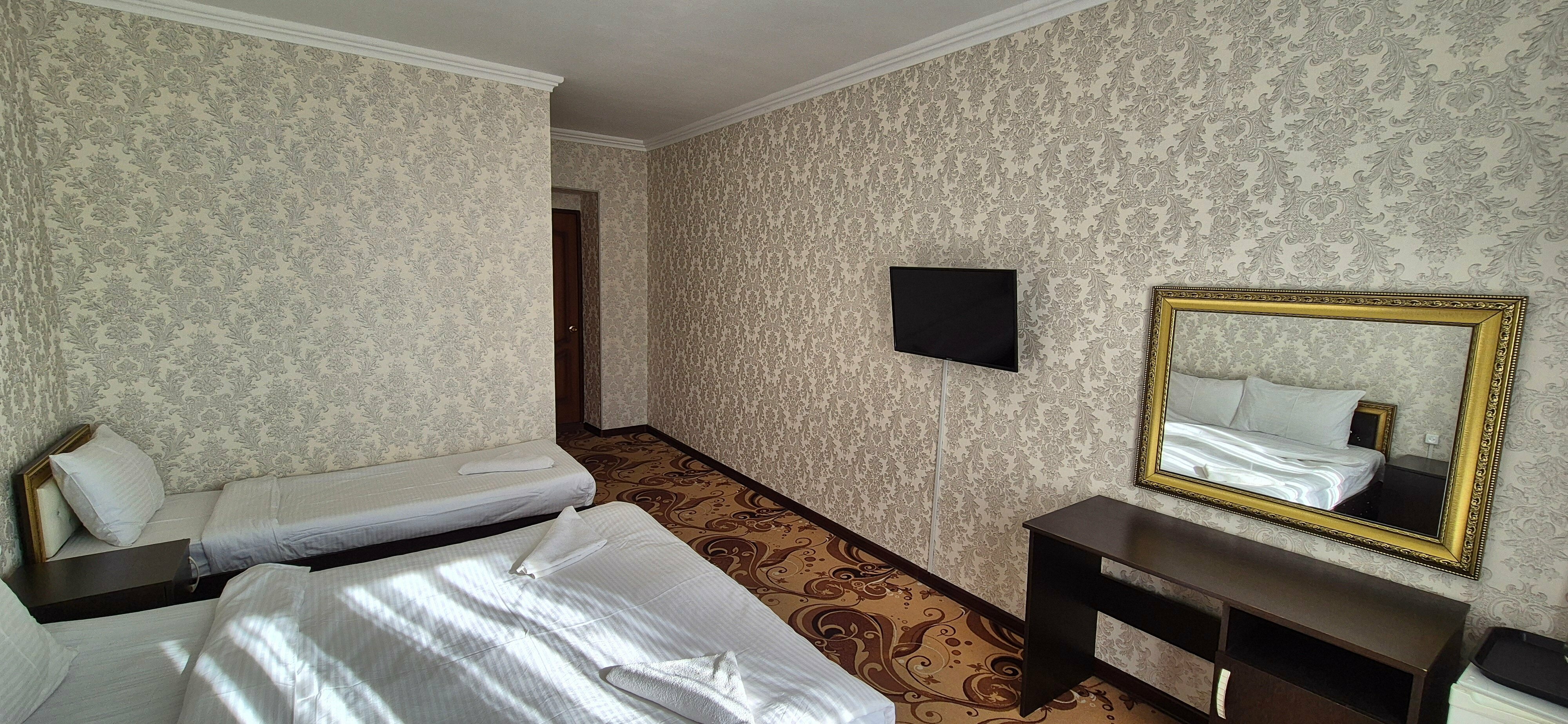 Трехместный номер с балконом