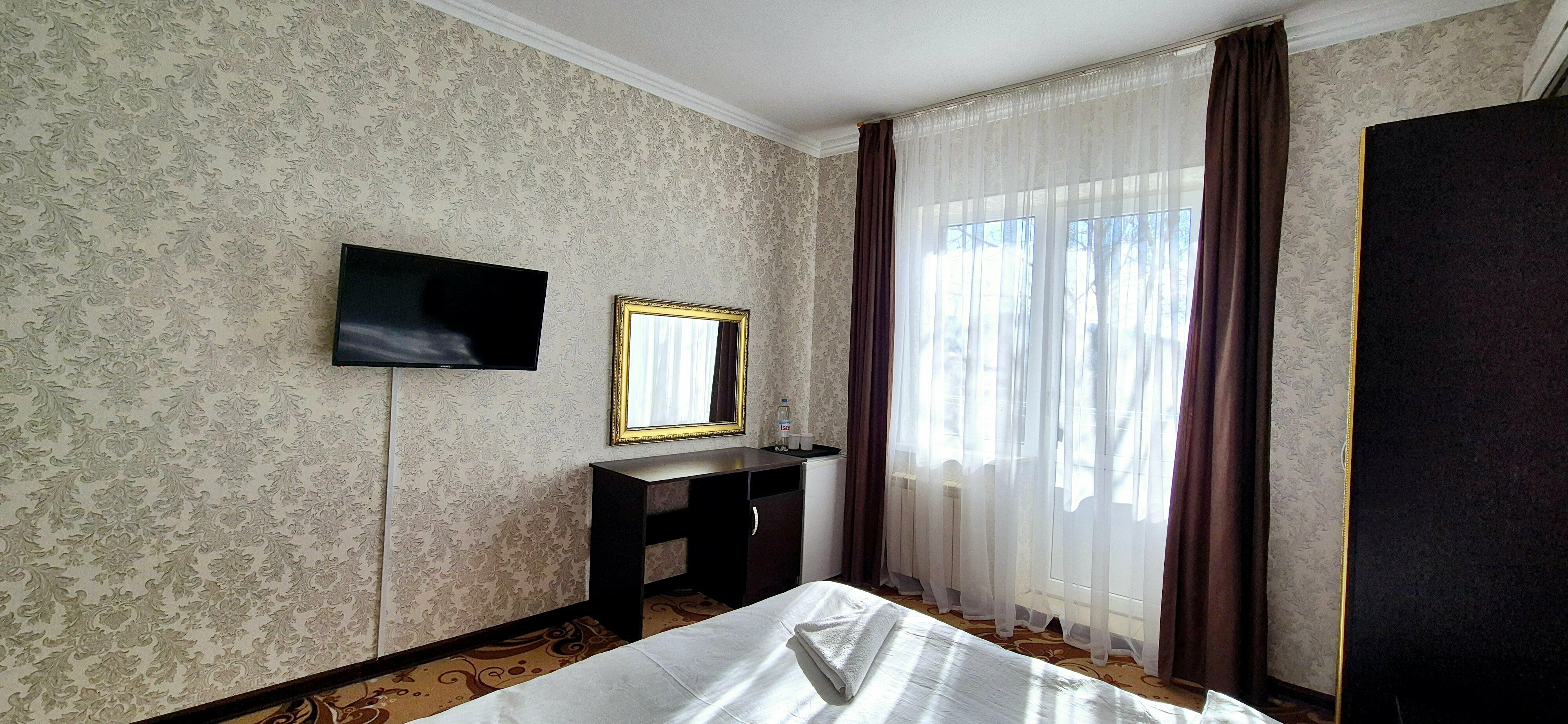 Трехместный номер с балконом