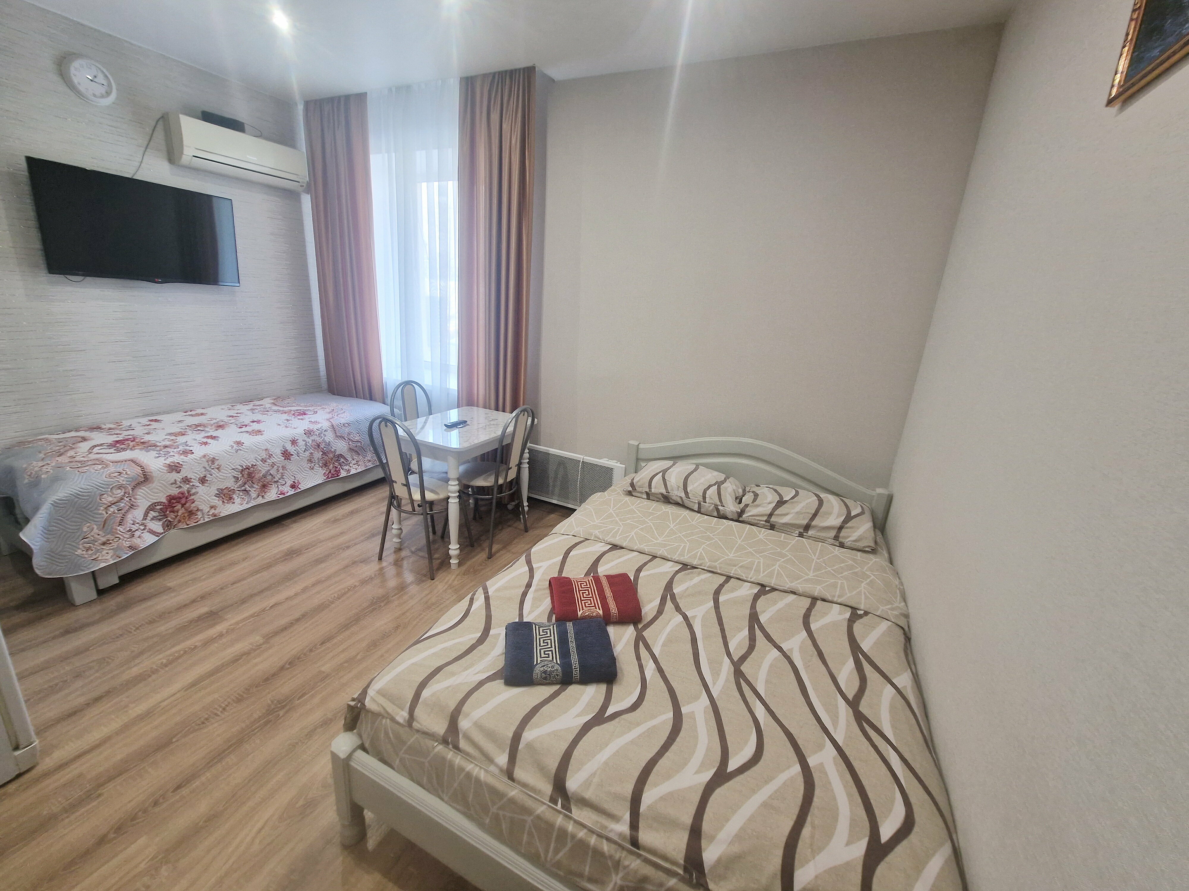 Четырехместный номер с ванной комнатой