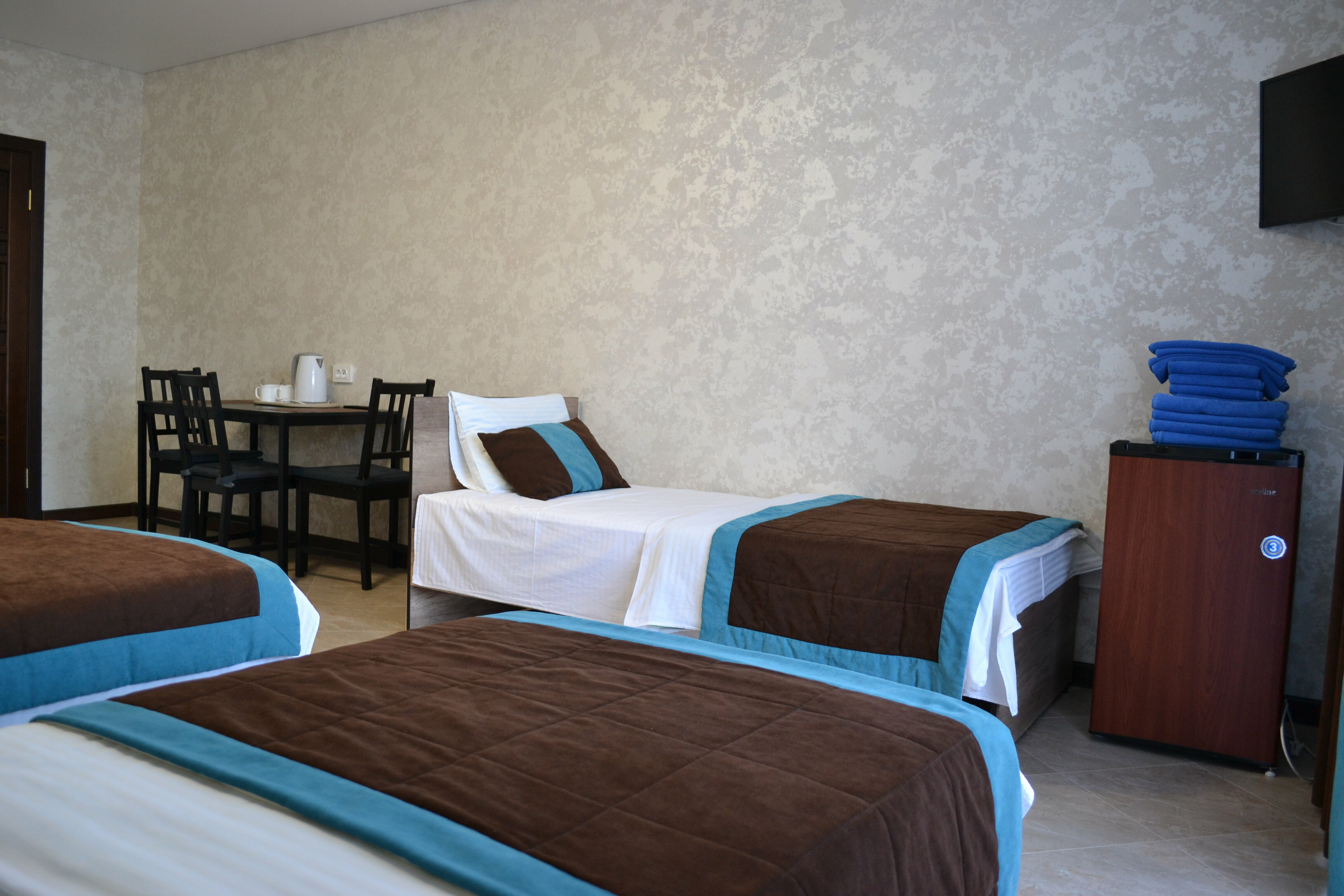 Улучшенный четырехместный номер