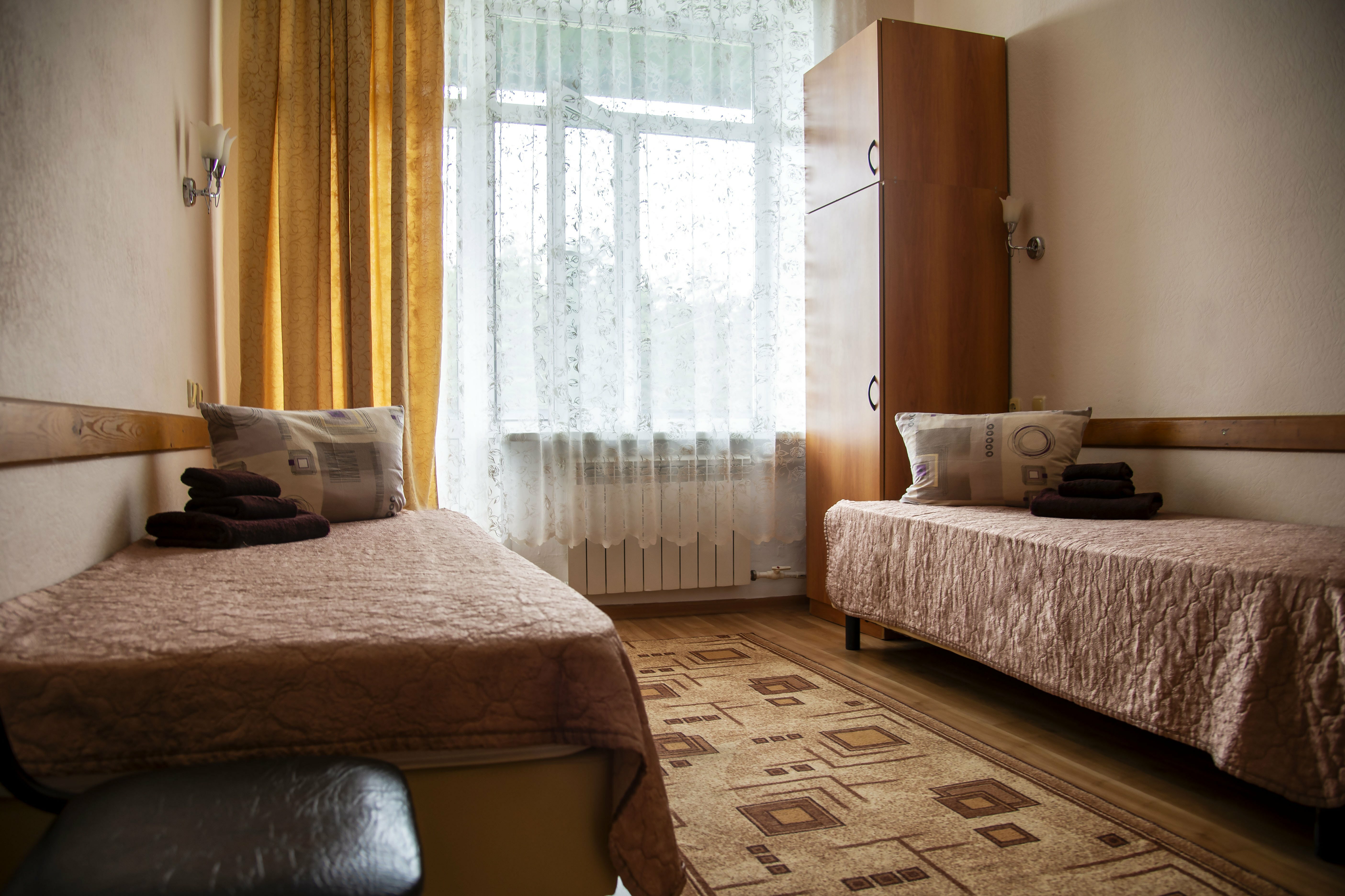 Двухместный номер с 2 отдельными кроватями и балконом