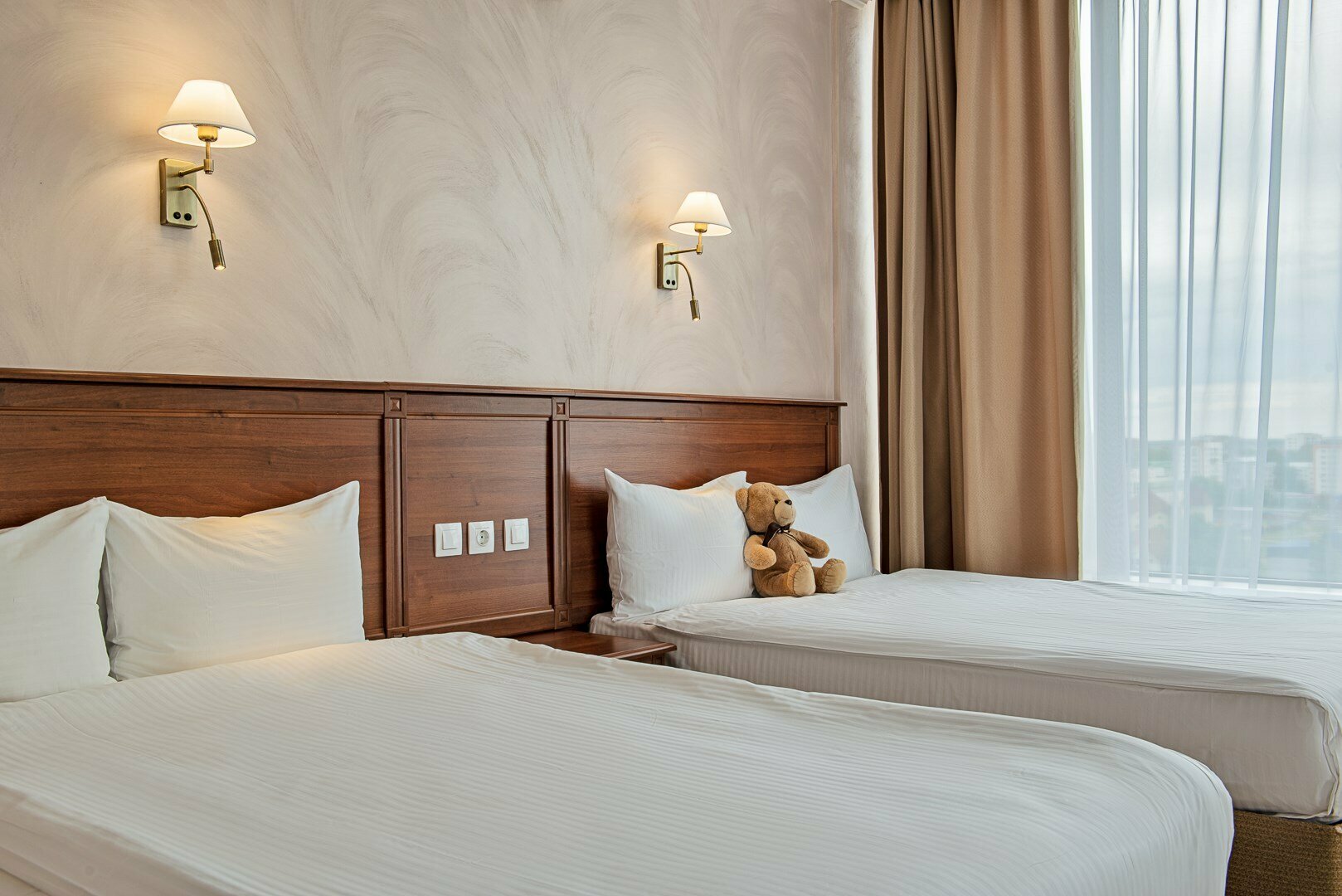 Просторный двухместный номер с 2 отдельными кроватями