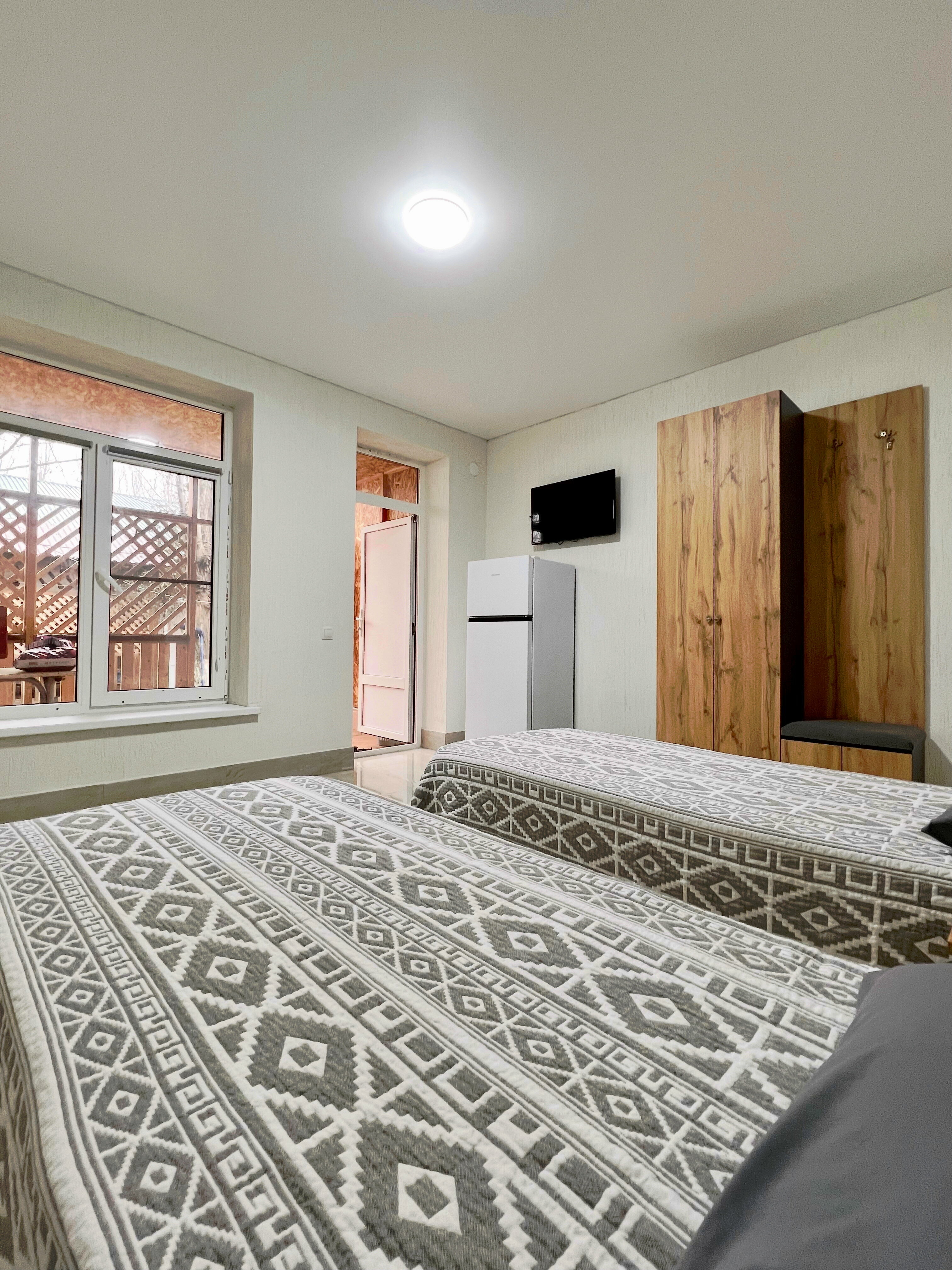 Трехместный Стандарт с двумя раздельными кроватями и диваном