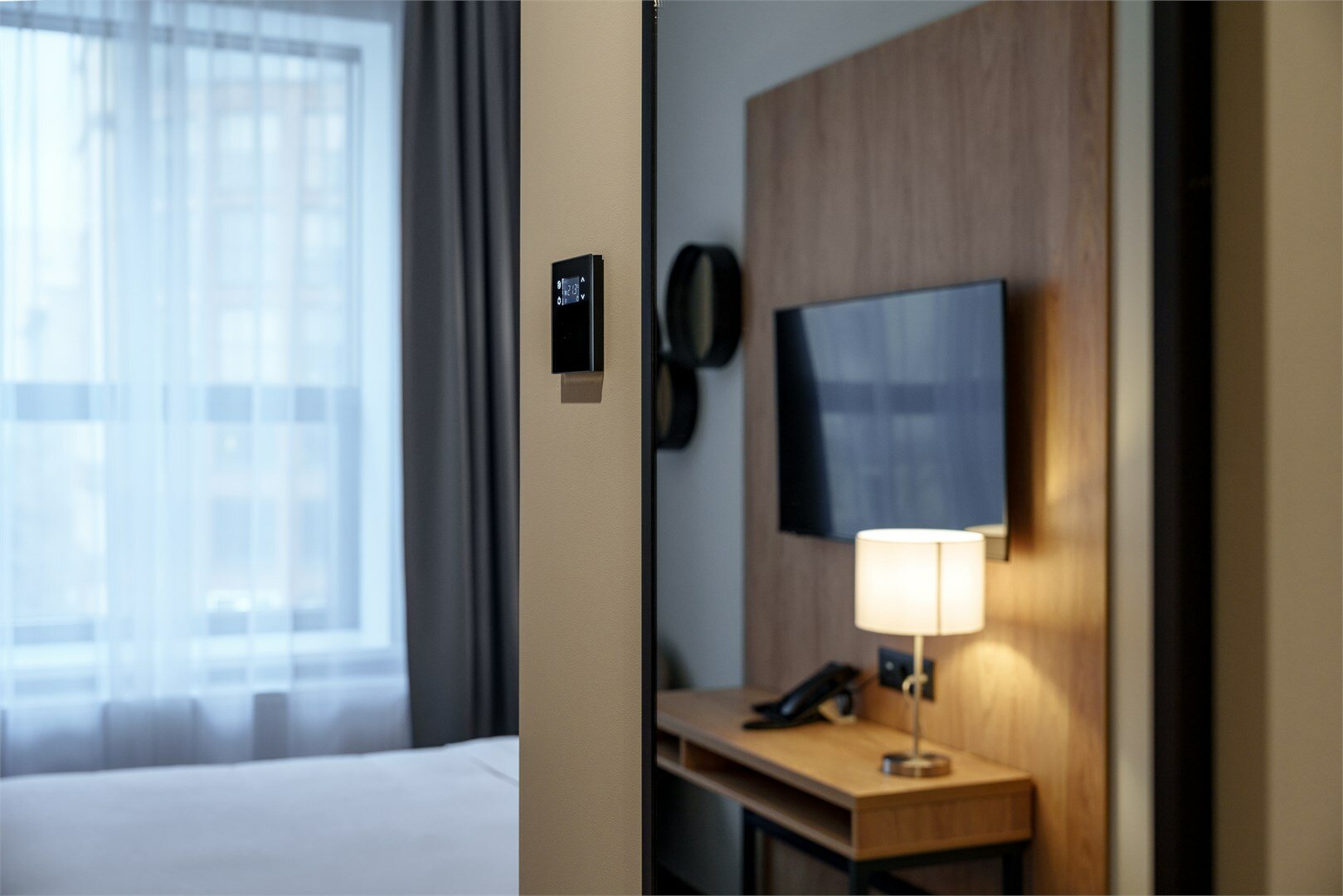 Стандартный номер с видом на город с двуспальной кроватью