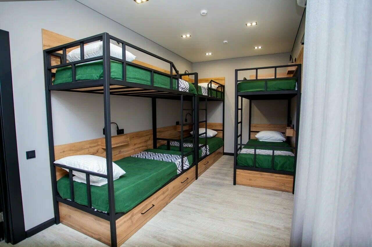 Хостел Комфорт Женский номер с шестью кроватями и общей ванной