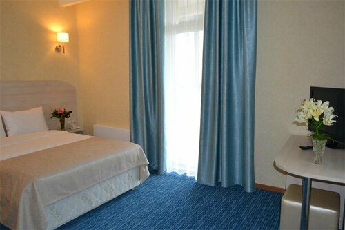 Стандарт улучшенный с одной двуспальной кроватью и балконом