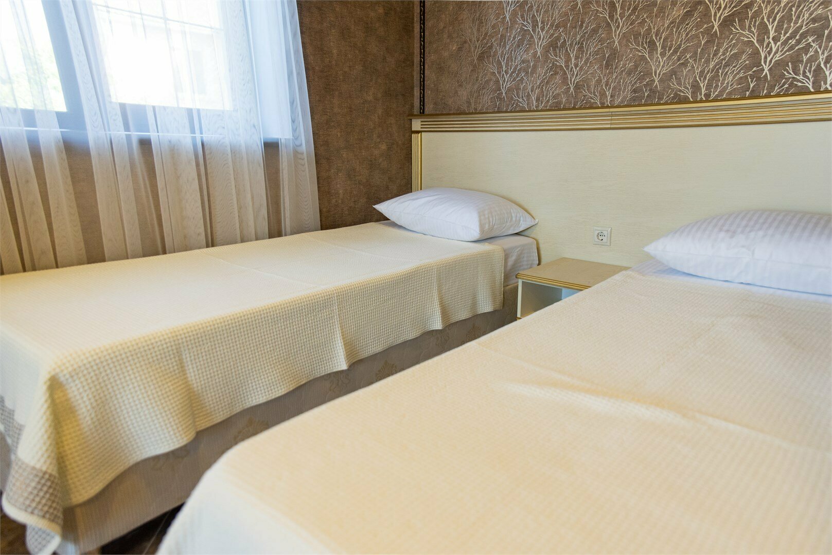 2-х местный стандарт с двумя раздельными кроватями и раскладным диваном