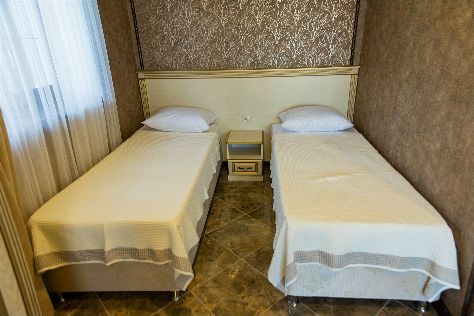 2-х местный стандарт с двумя раздельными кроватями и раскладным диваном