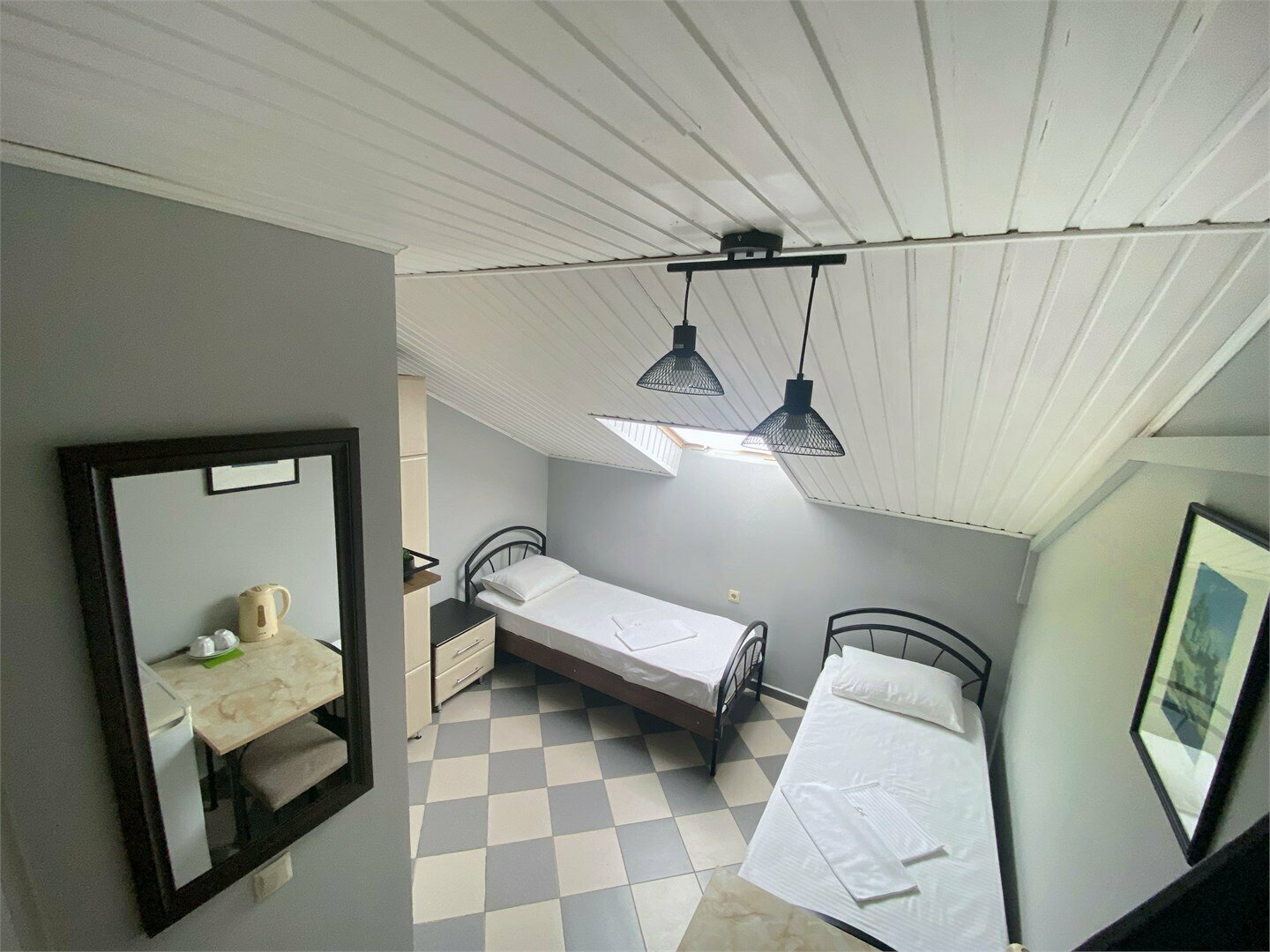 Двухместный номер с 2 отдельными кроватями и окном