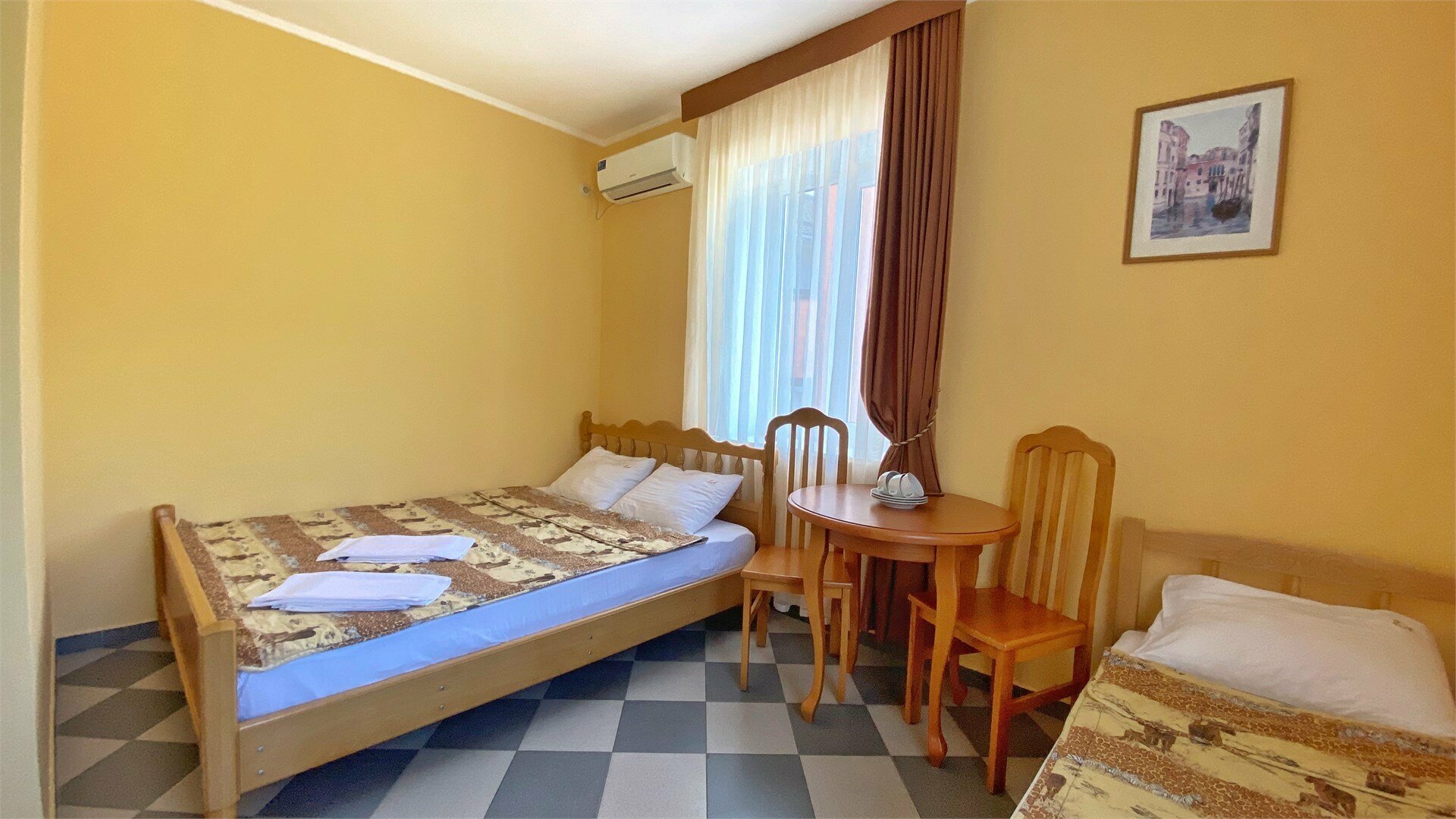 Улучшенный трехместный номер