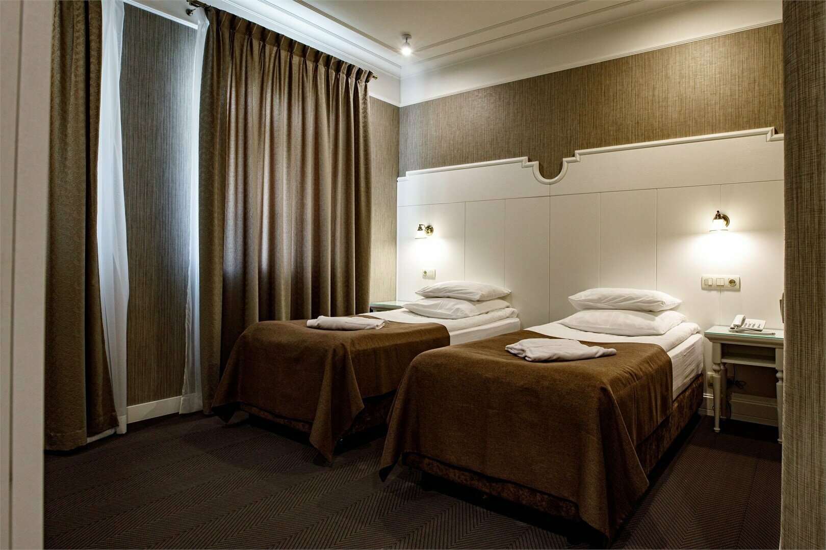 Двухместный номер с двуспальной или двумя односпальными кроватями