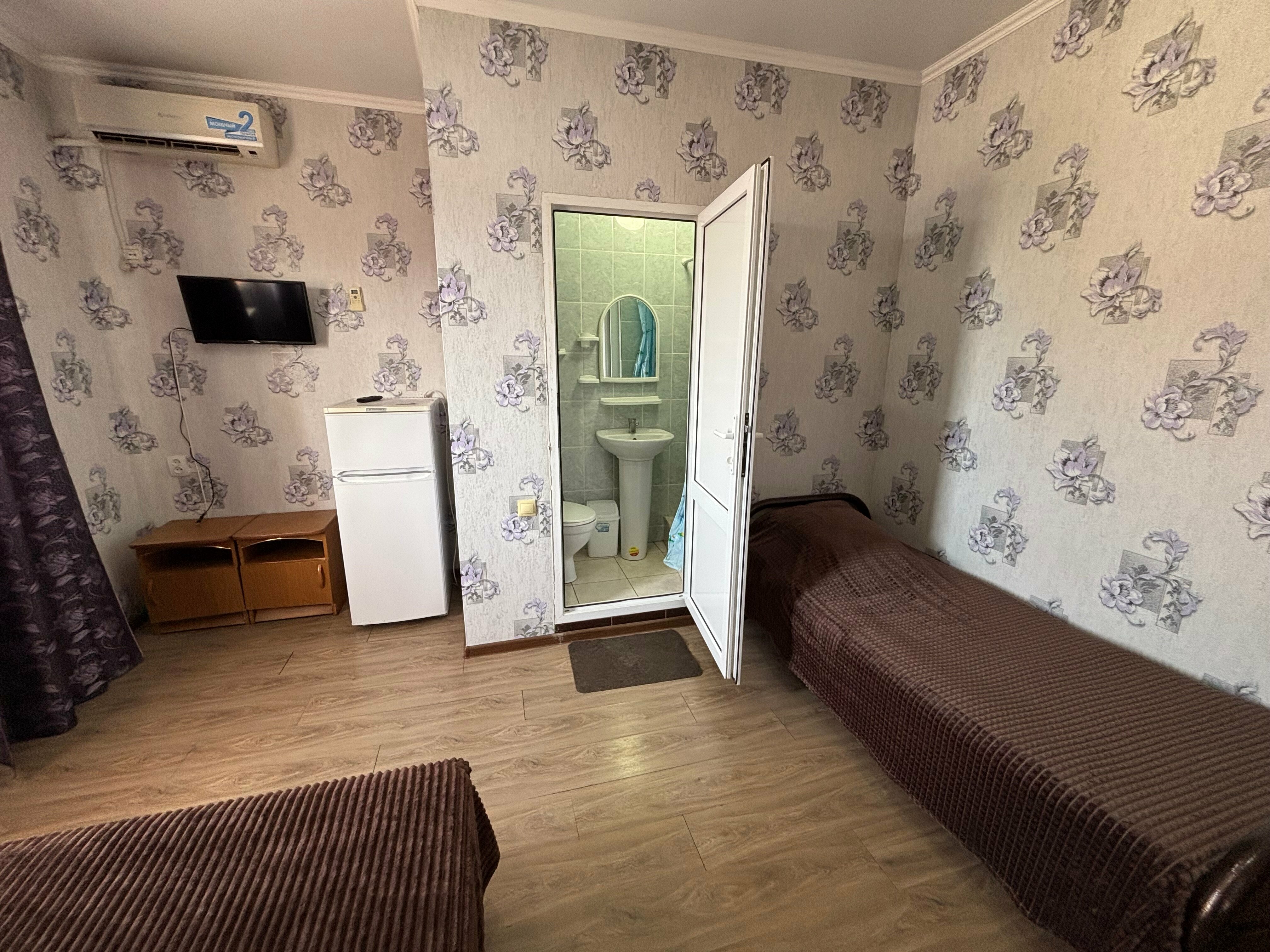 Трехместный номер с балконом