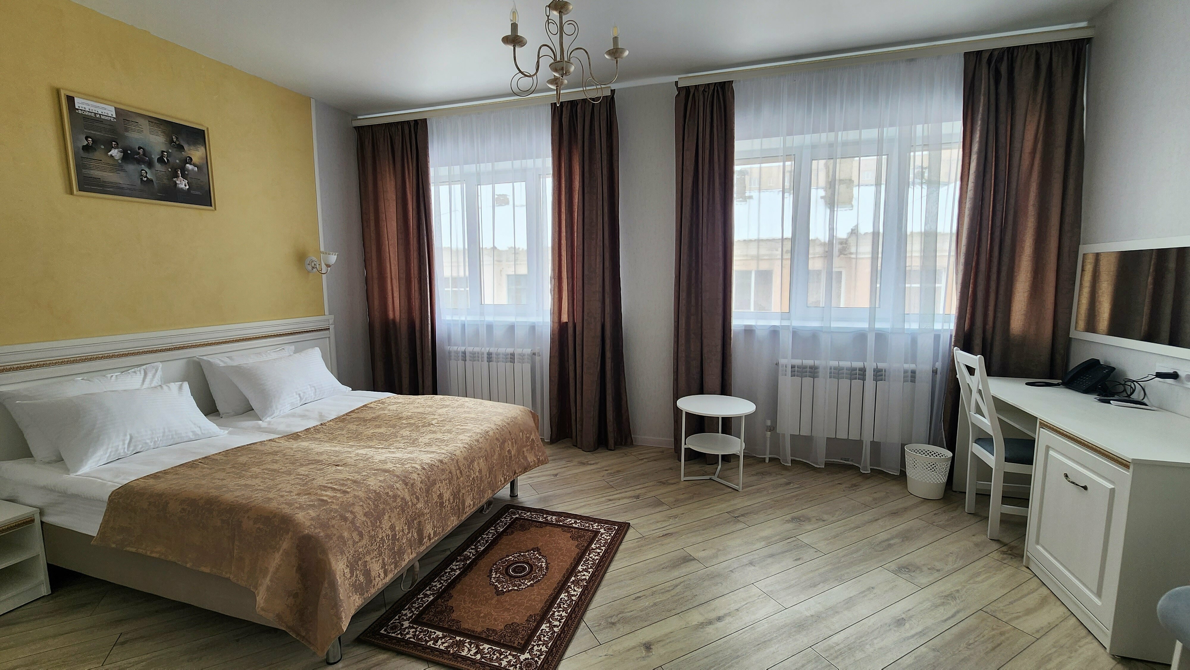 Делюкс с одной двухспальной кроватью