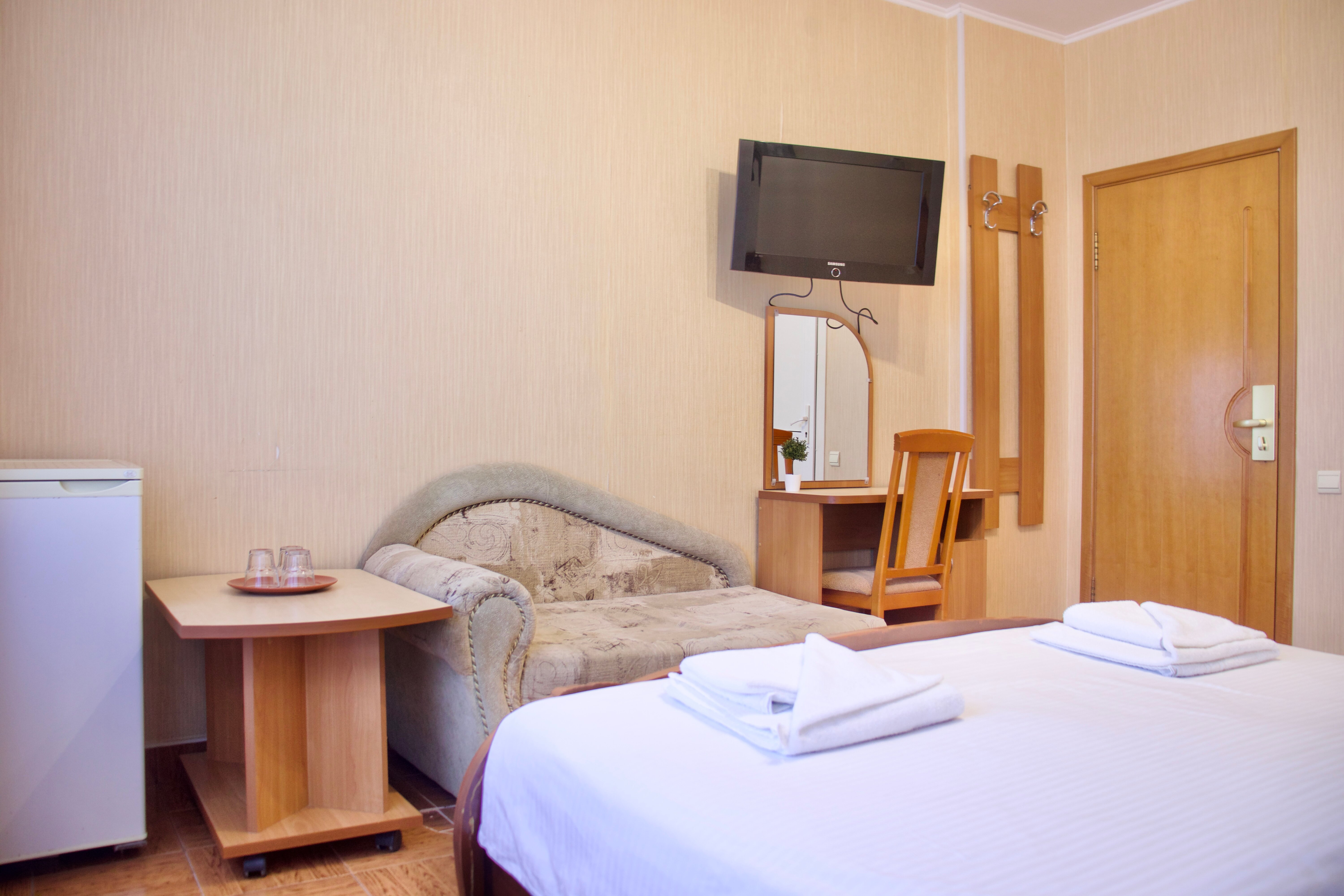 Трехместный номер с балконом