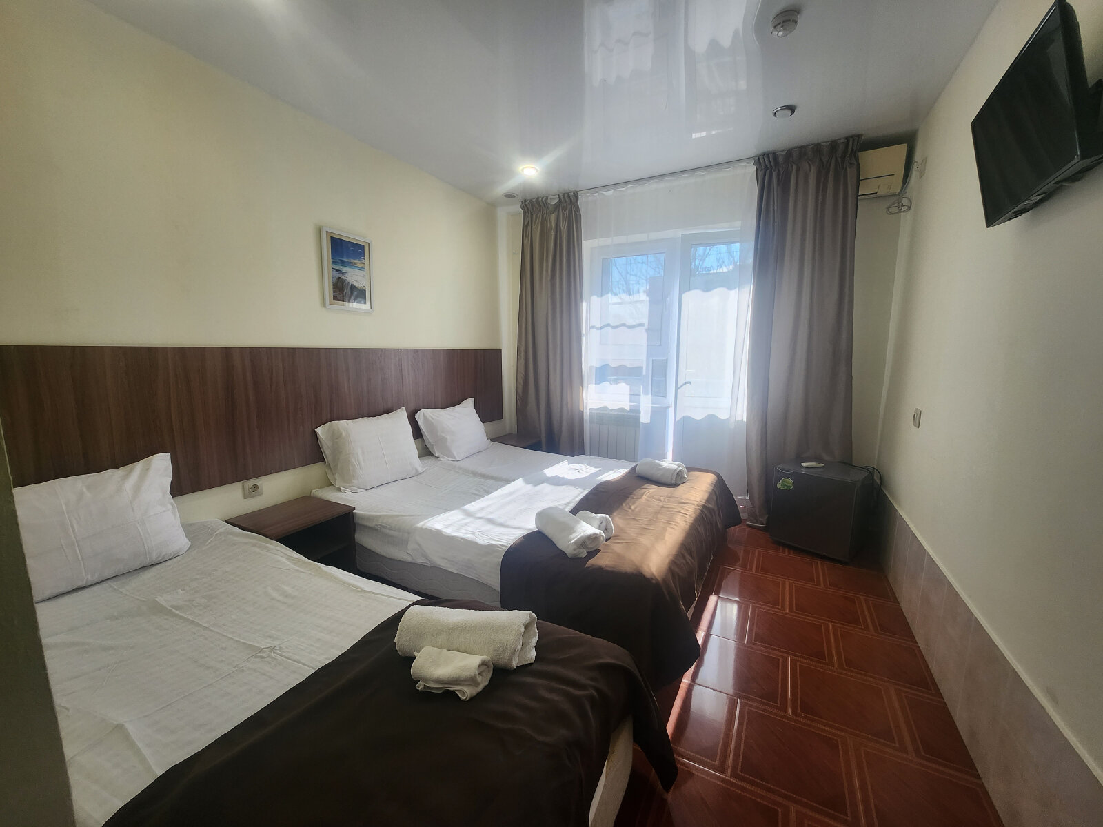 Трехместный номер с балконом