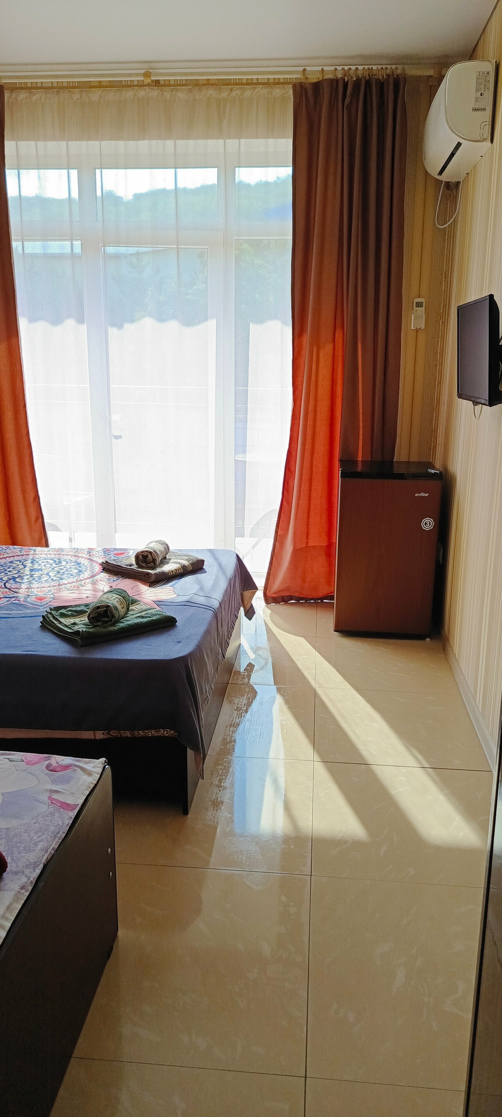 Трехместный номер с балконом