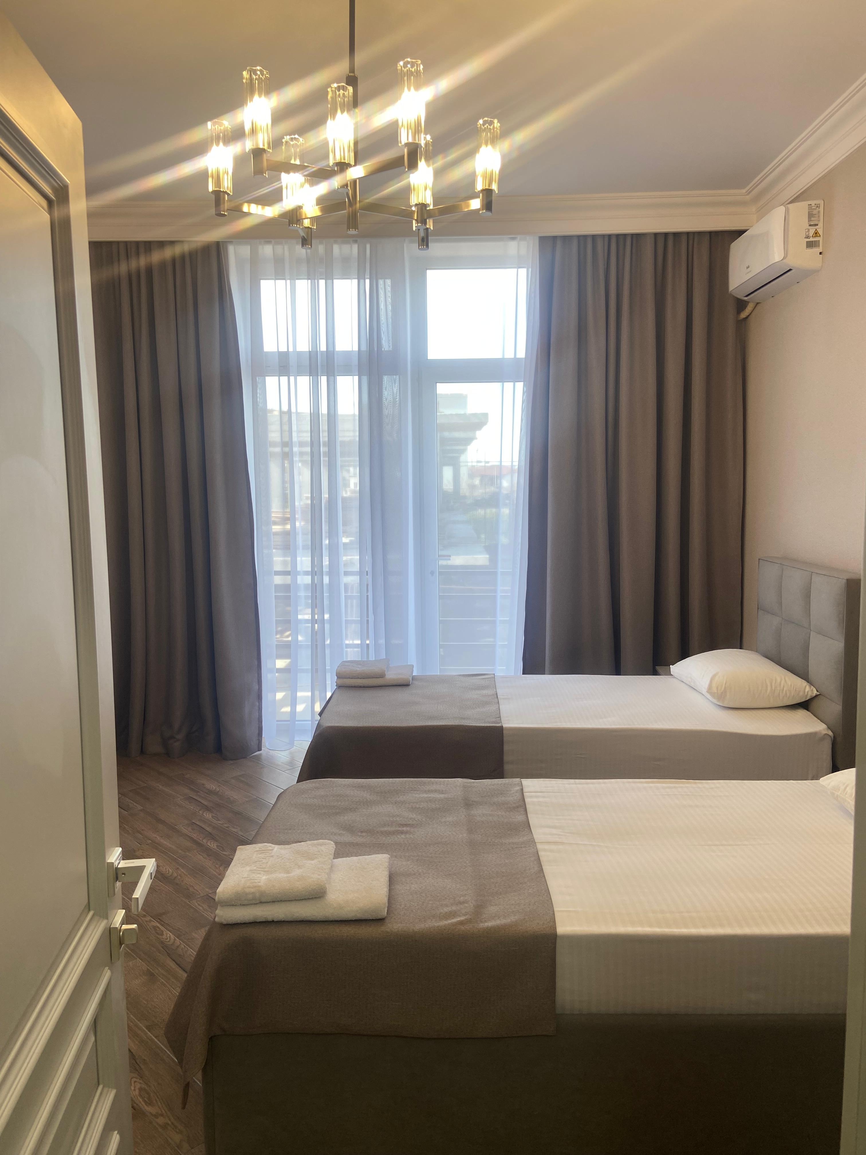 Улучшенный двухместный номер  люкс с раздельными кроватями