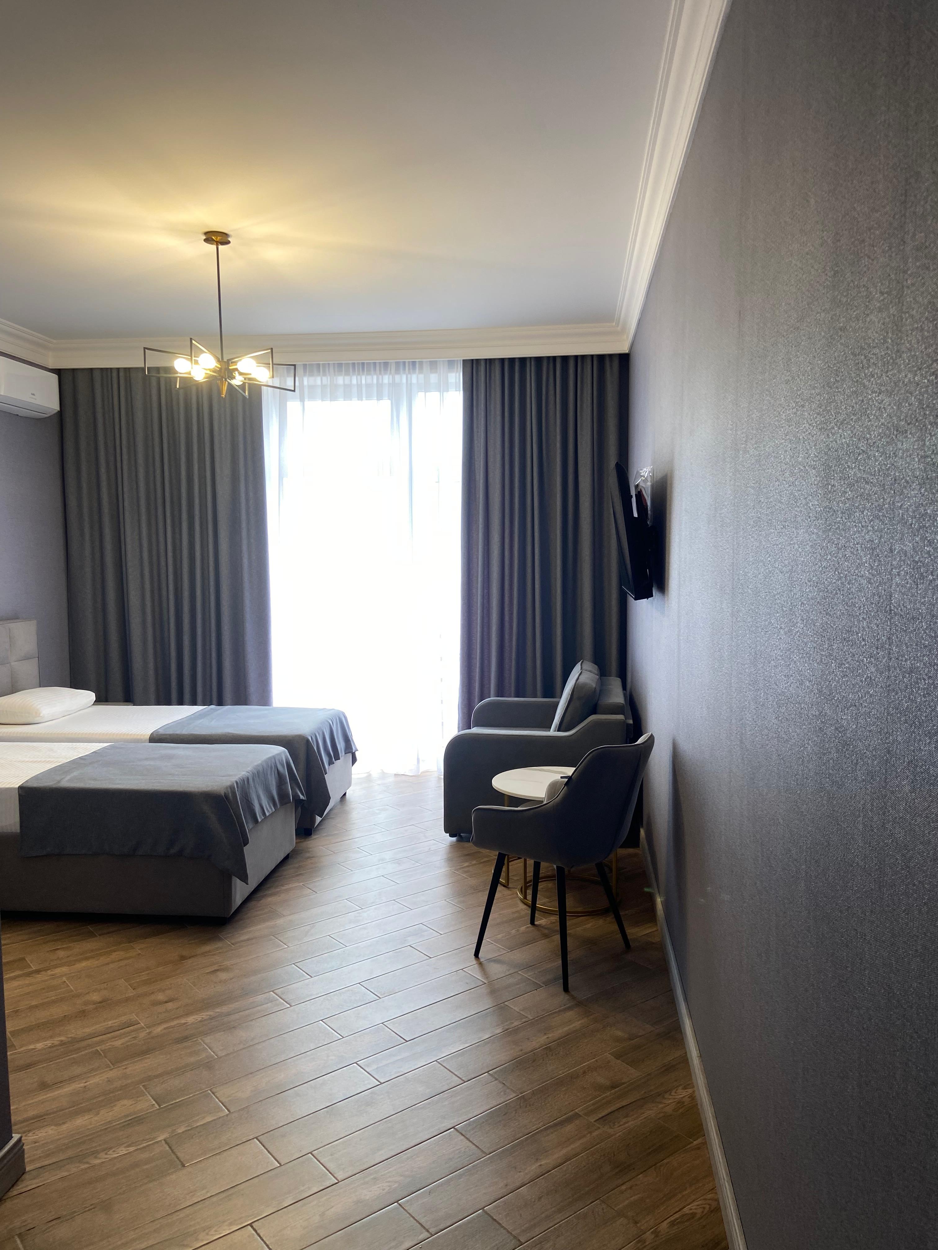 Улучшенный трехместный номер с видом на море