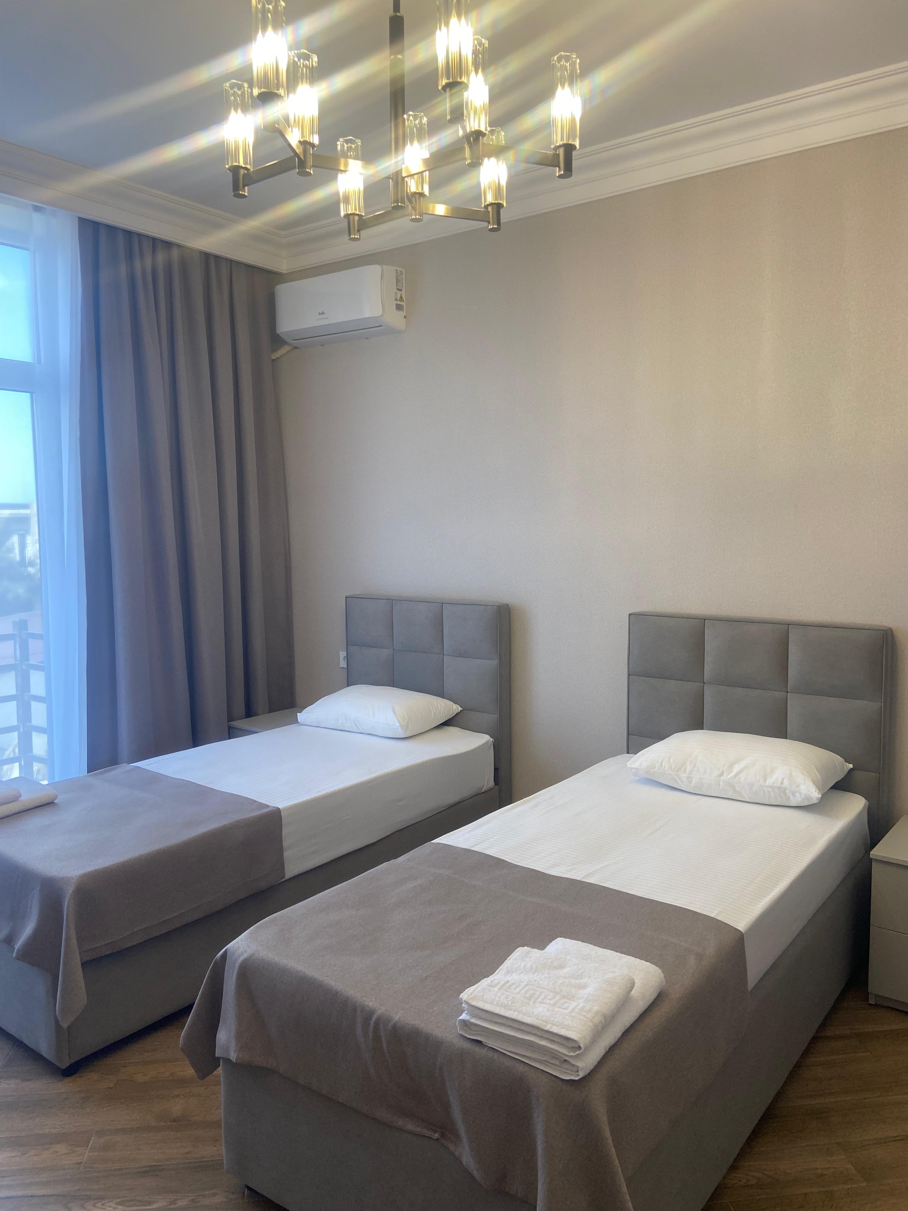 Улучшенный двухместный номер  люкс с раздельными кроватями