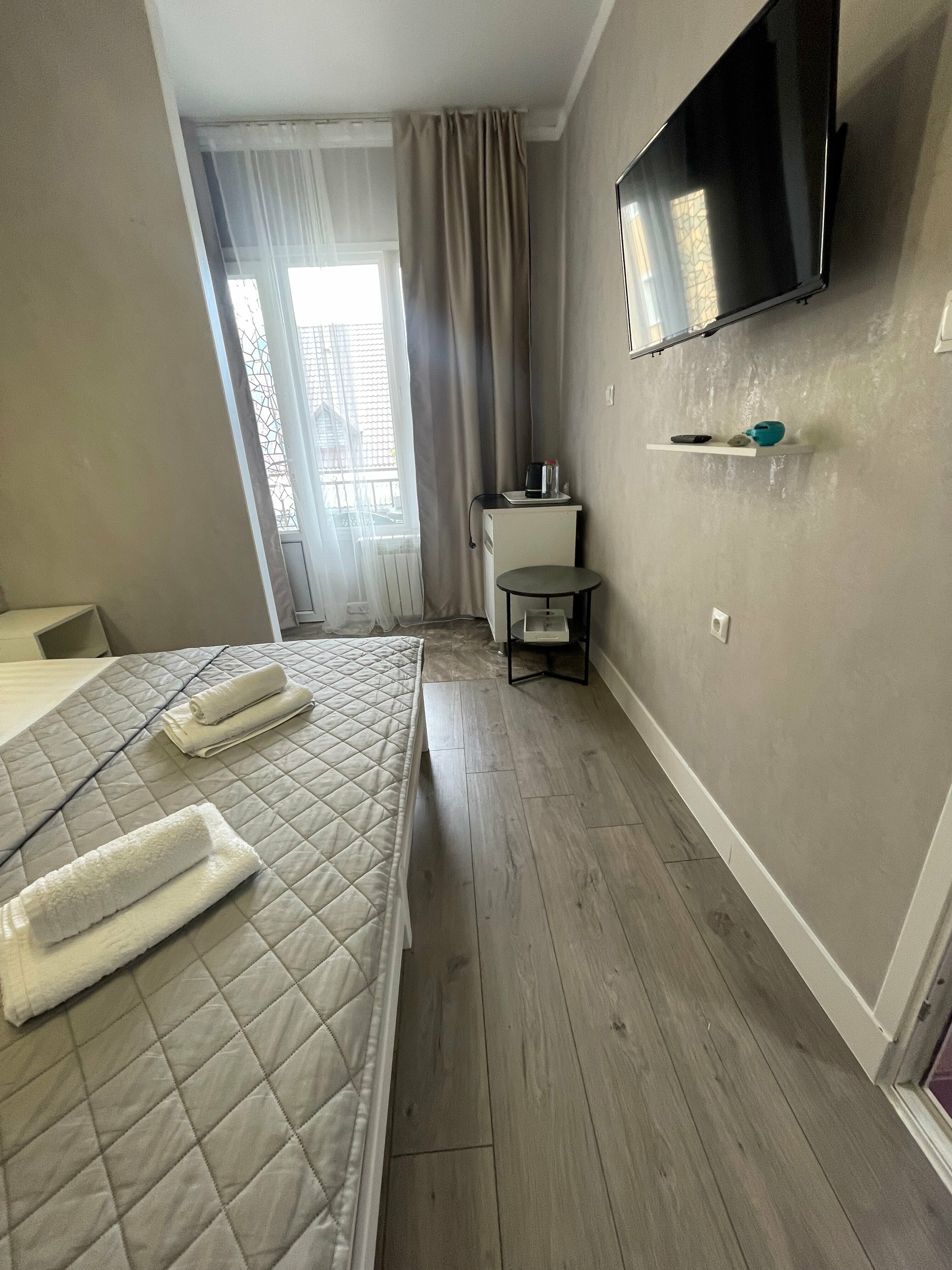 Трехместный номер с балконом