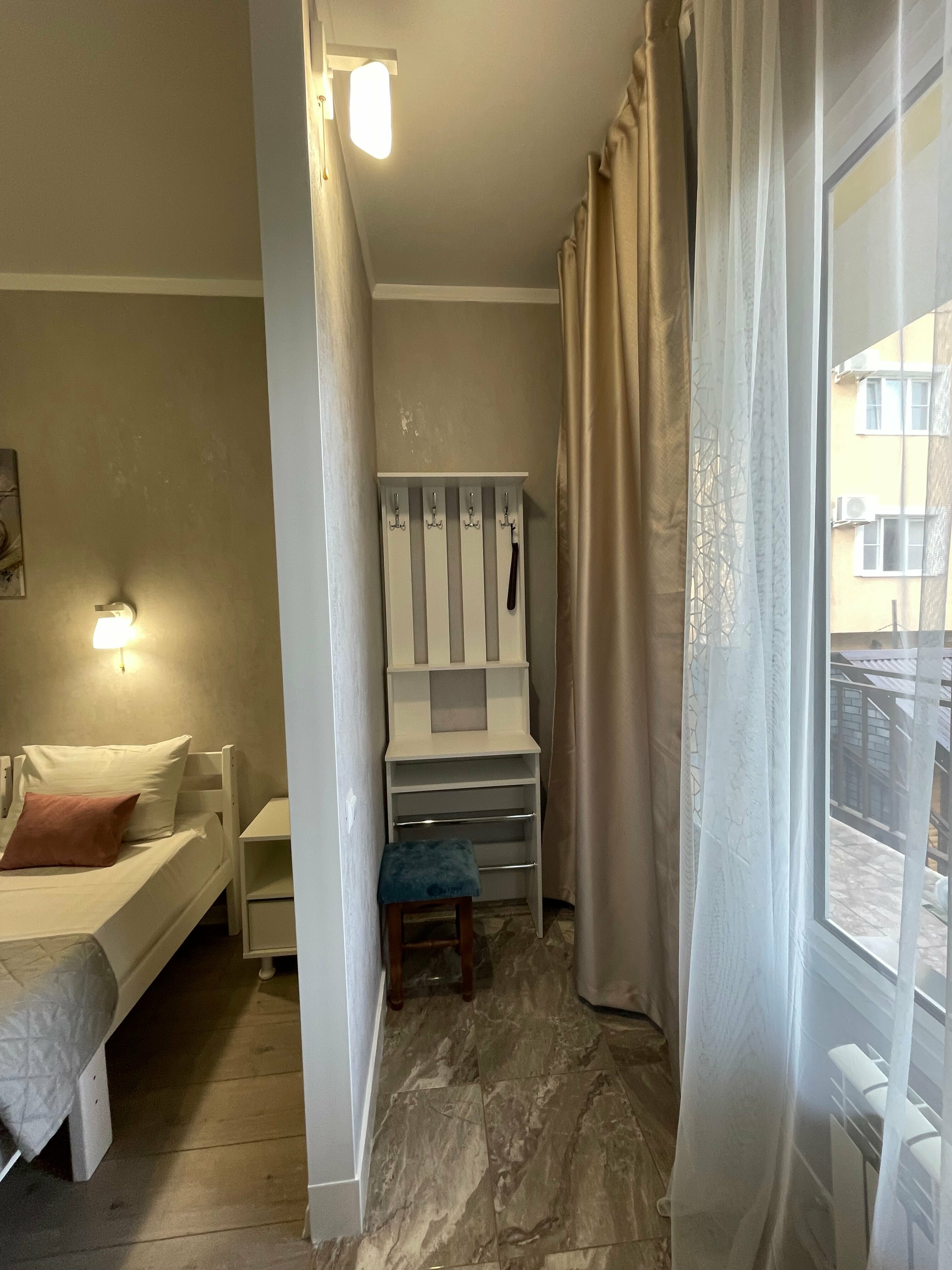 Трехместный номер с балконом