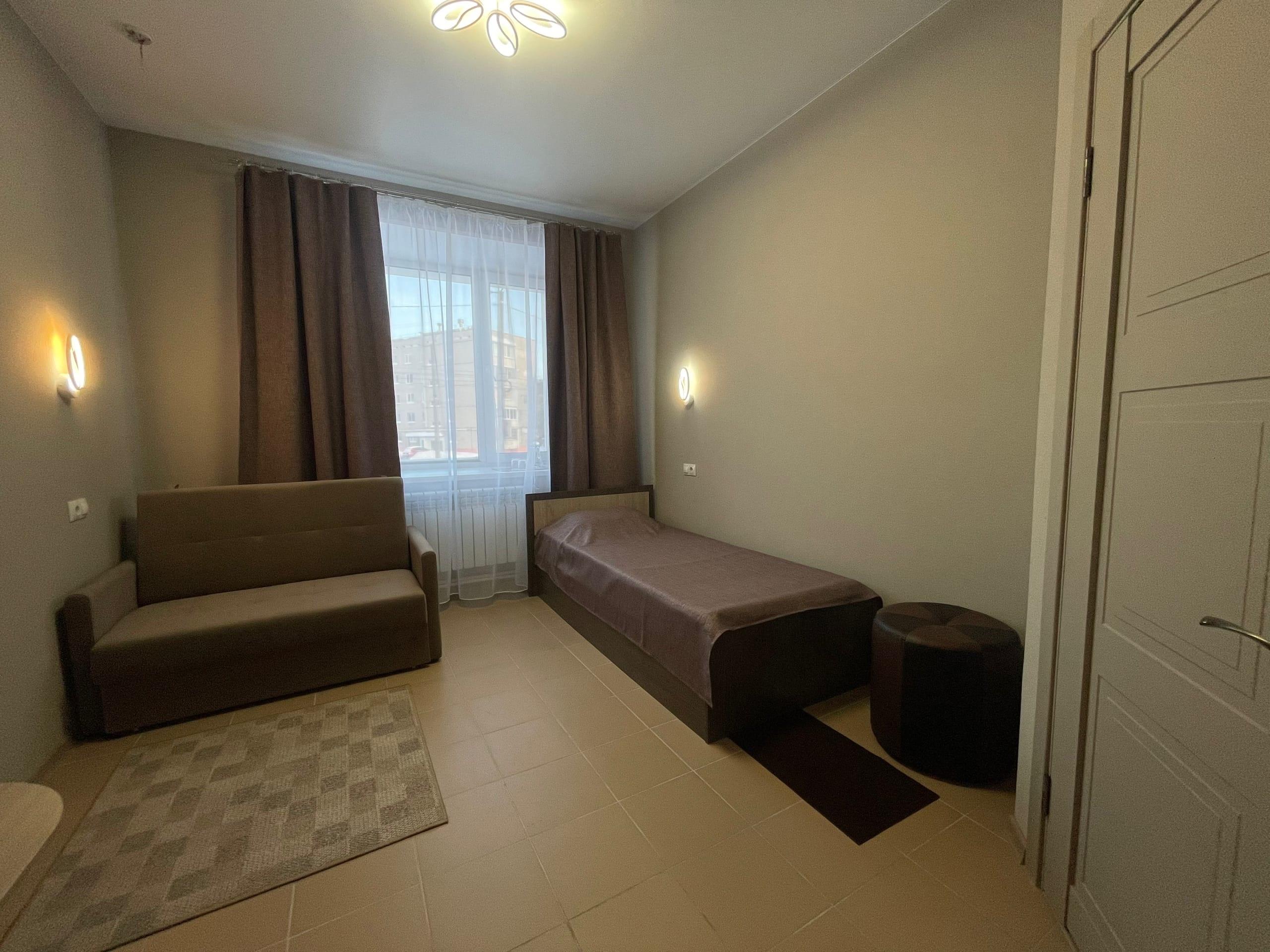 Двухместный номер с 2 отдельными кроватями и душем