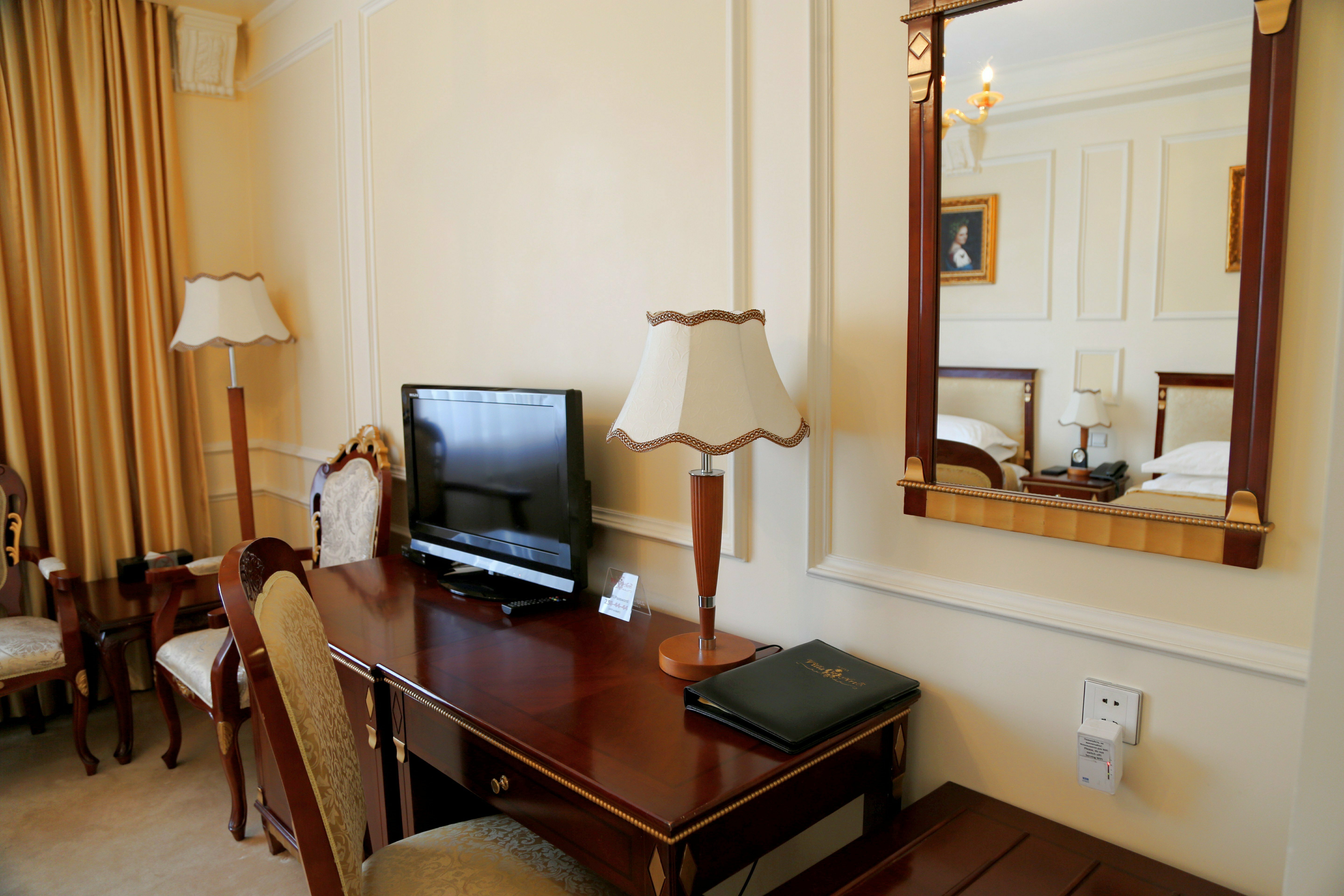 Двухместный номер с 2 отдельными кроватями и боковым видом на море