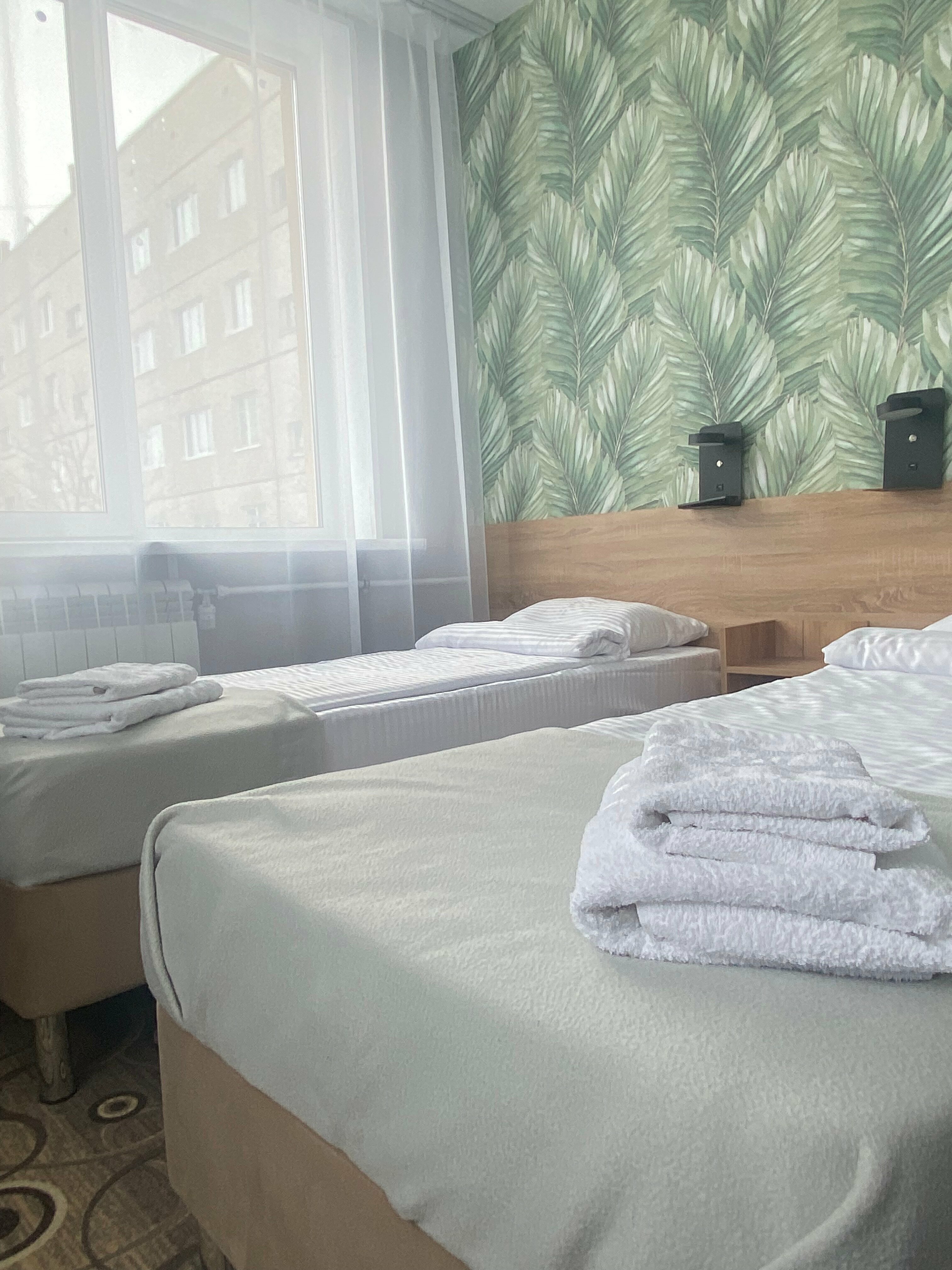 Улучшенный двухместный номер с 2 отдельными кроватями