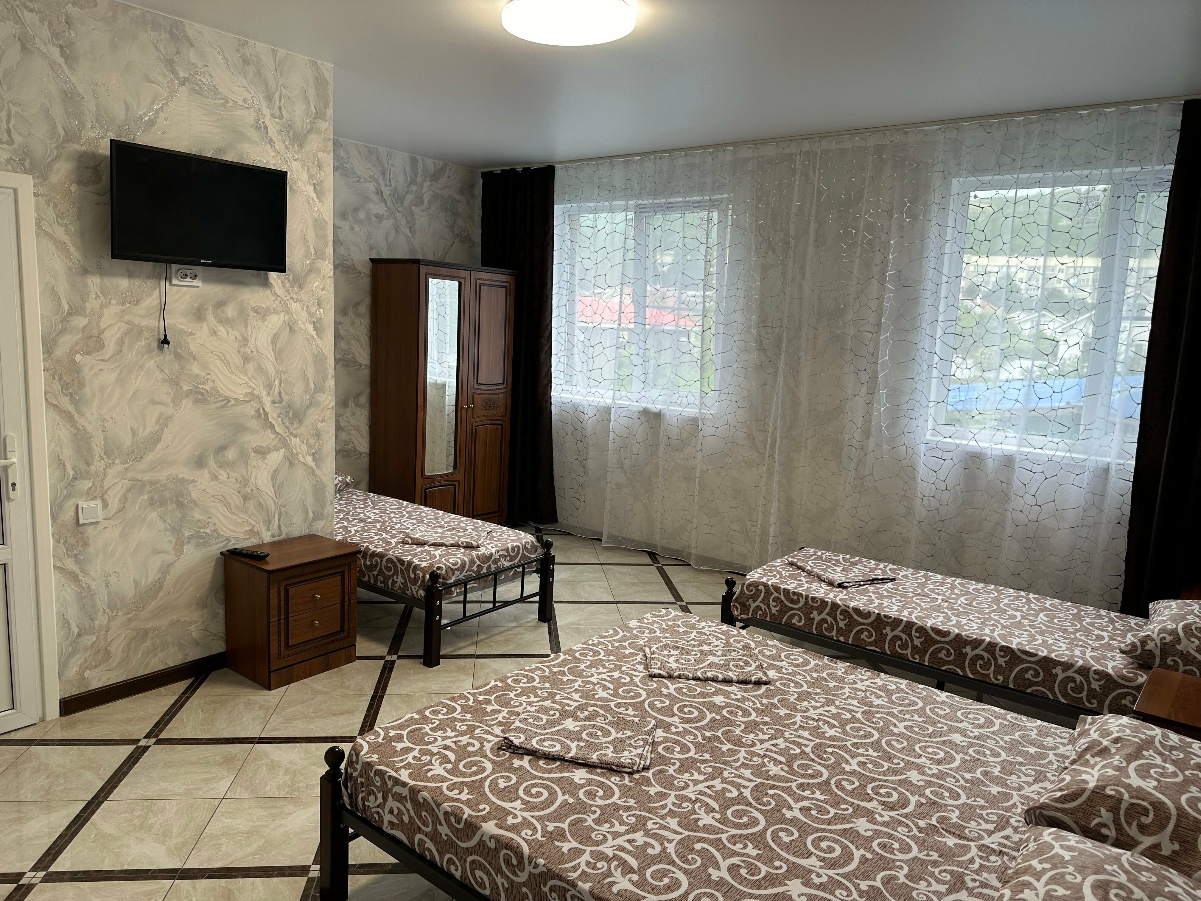 Улучшенный четырехместный номер