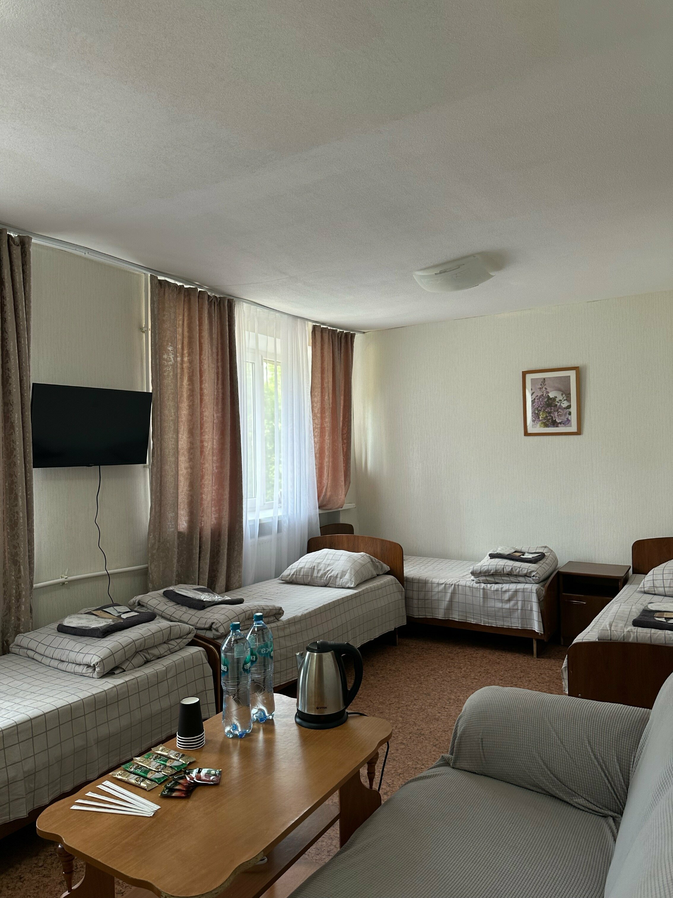 Стандартный семейный номер с 5 отдельными кроватями