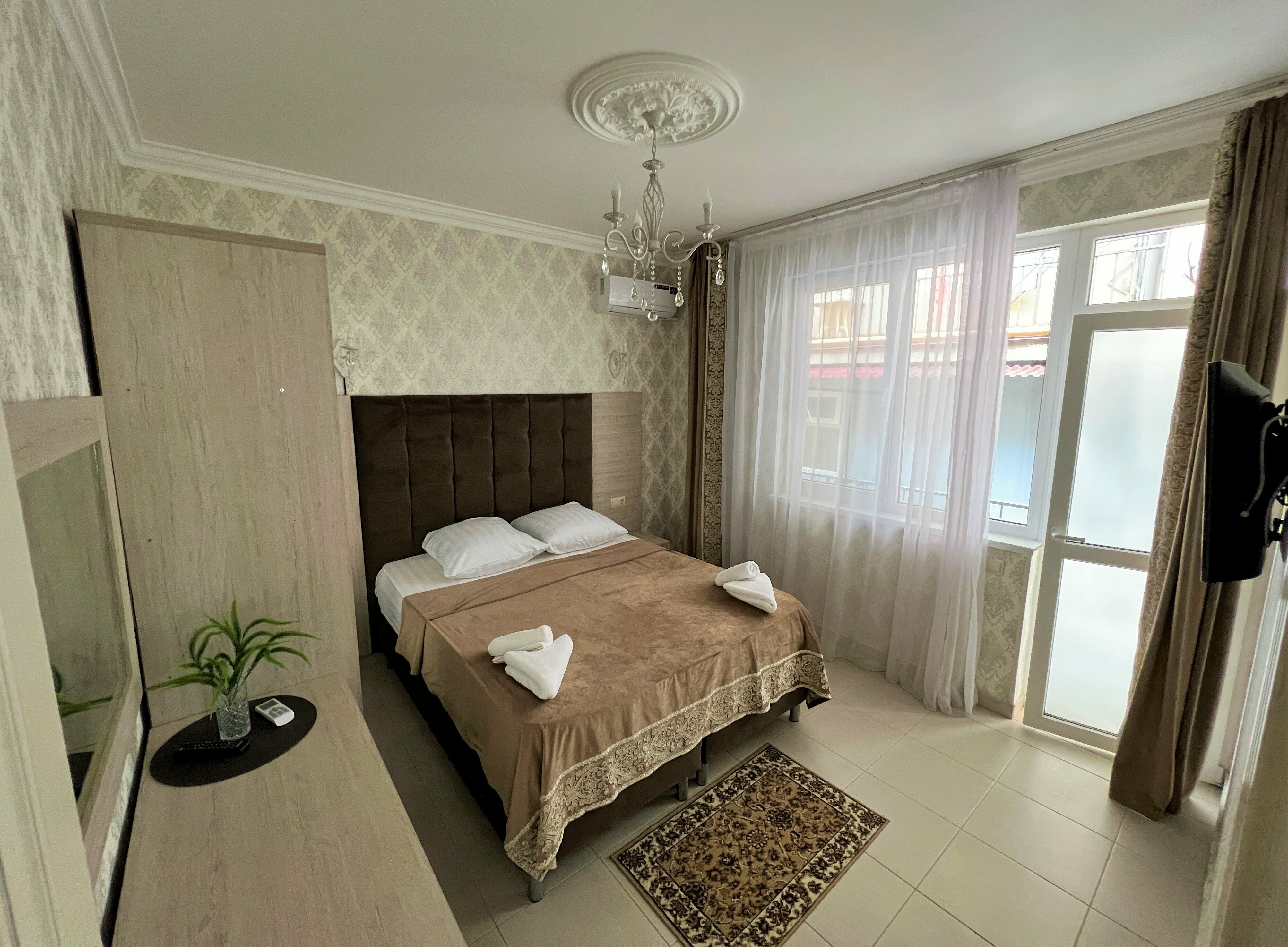 Четырехместный номер с балконом