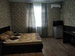 Улучшенный номер с кроватью размера «king-size» в Лирион
