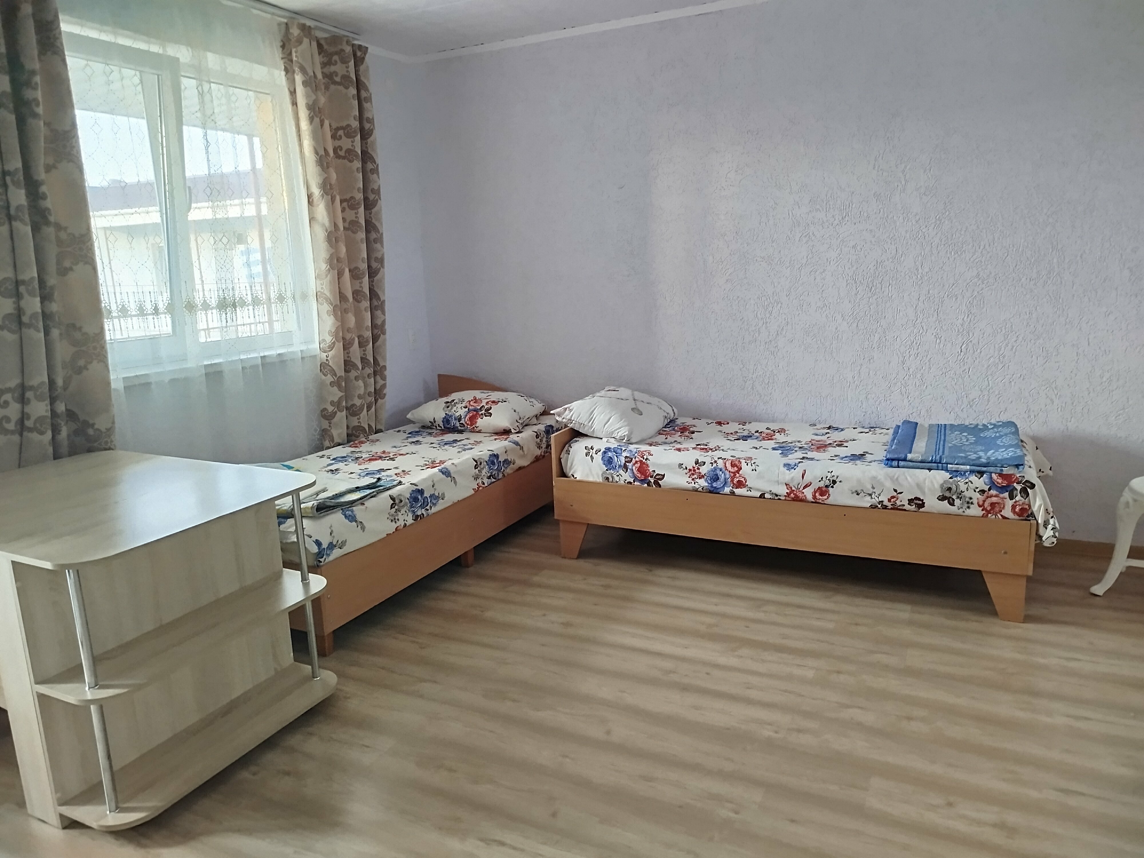 Улучшенный четырехместный номер