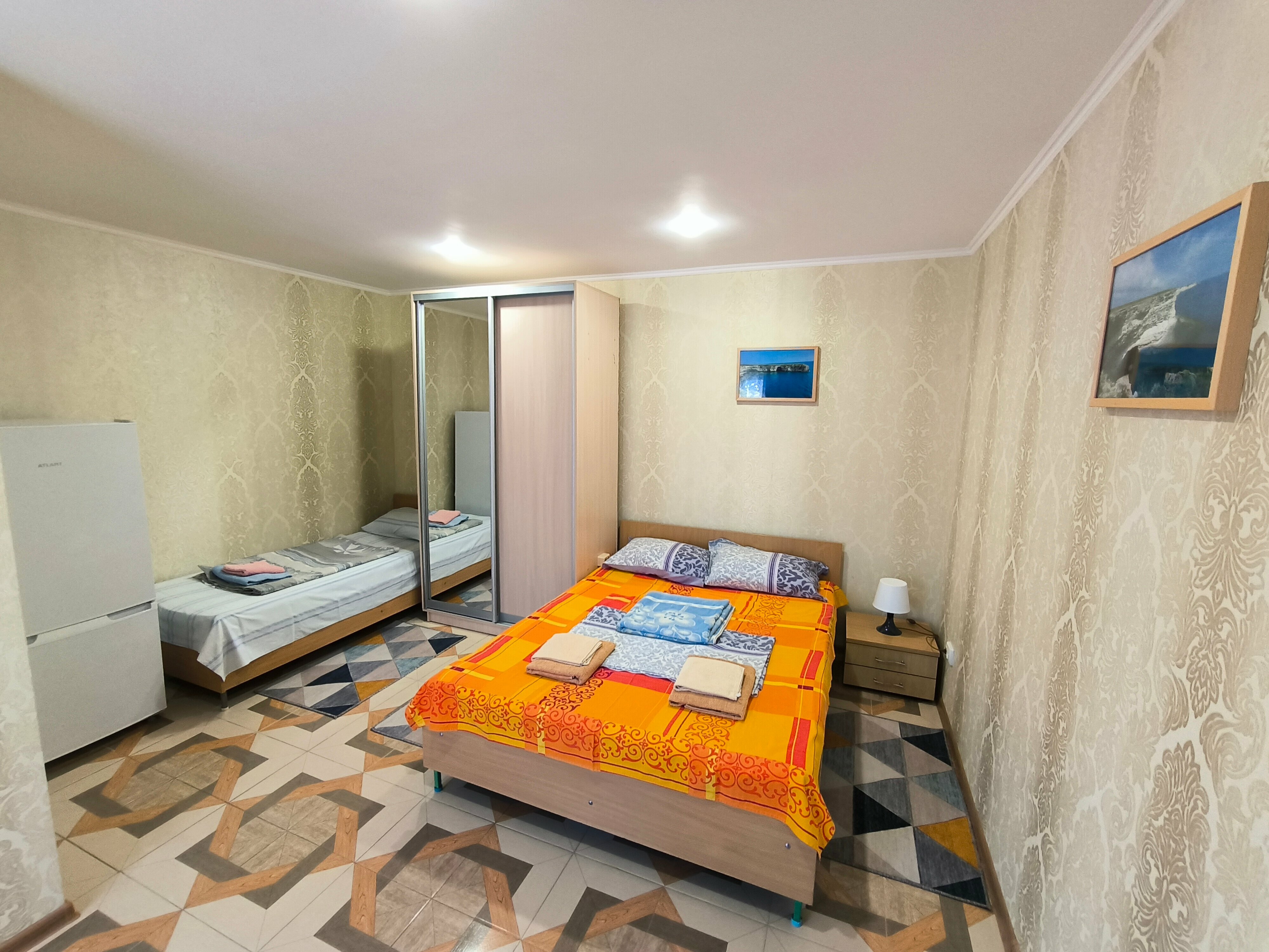 Трехместный номер с балконом