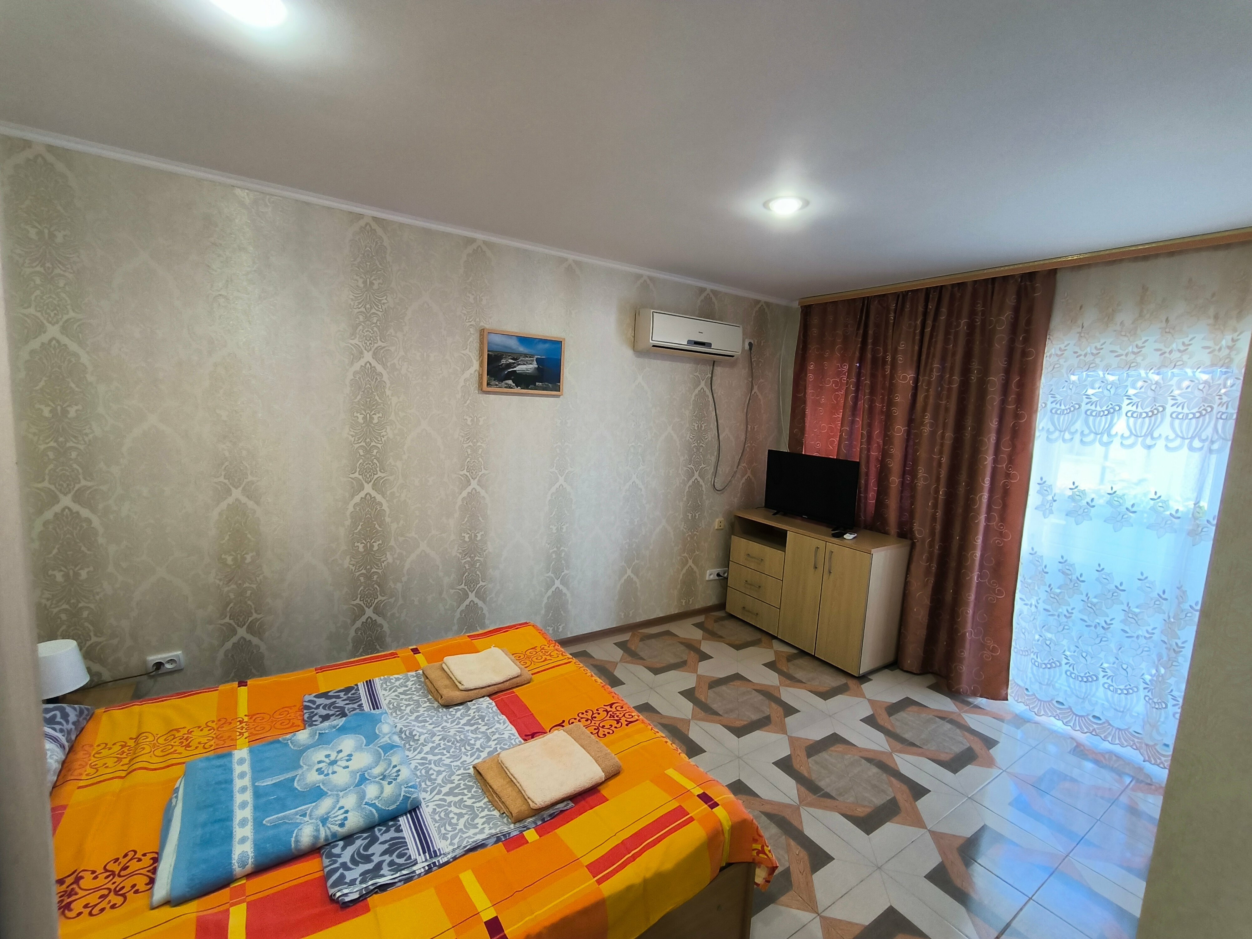 Трехместный номер с балконом