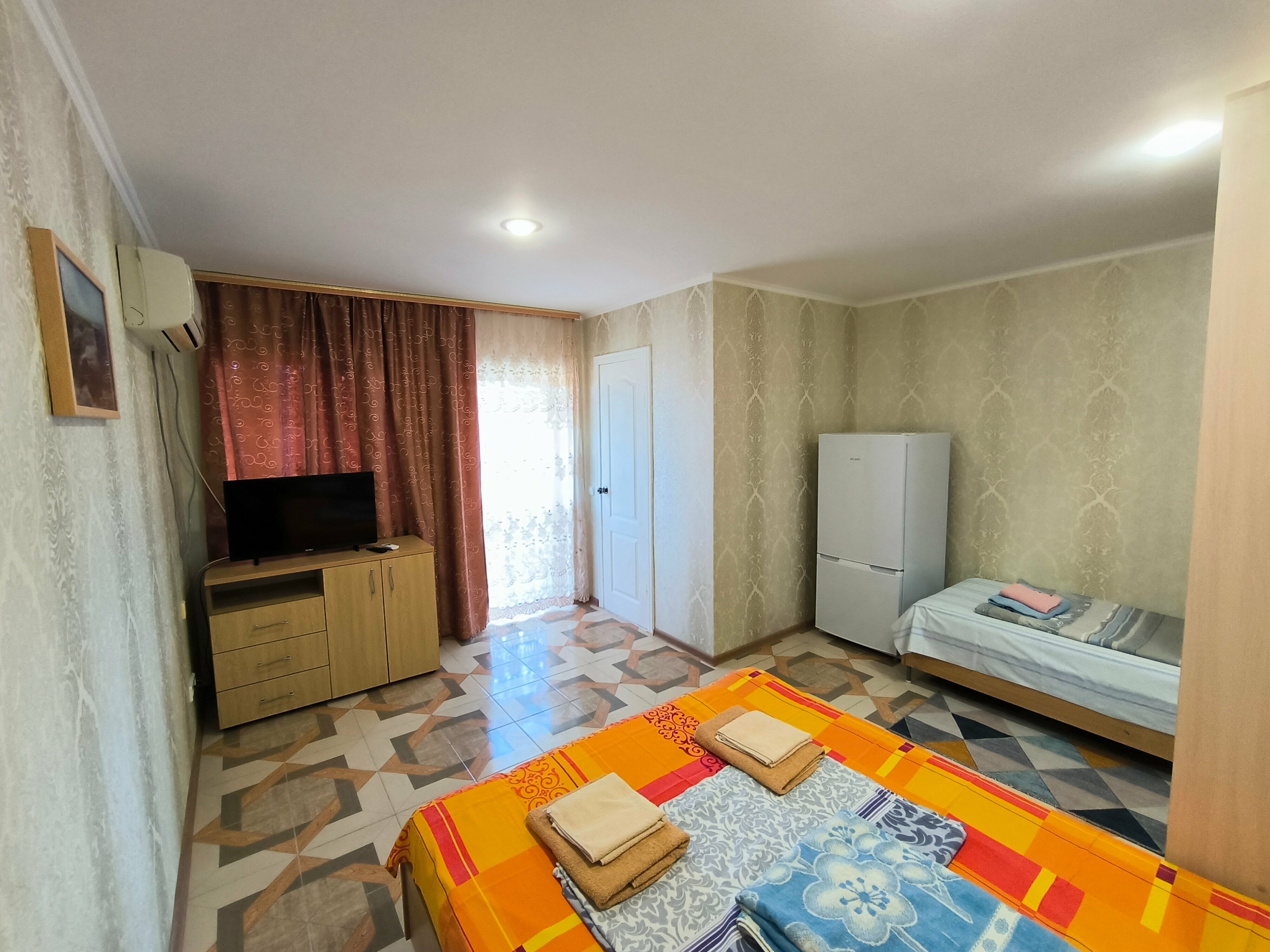 Трехместный номер с балконом