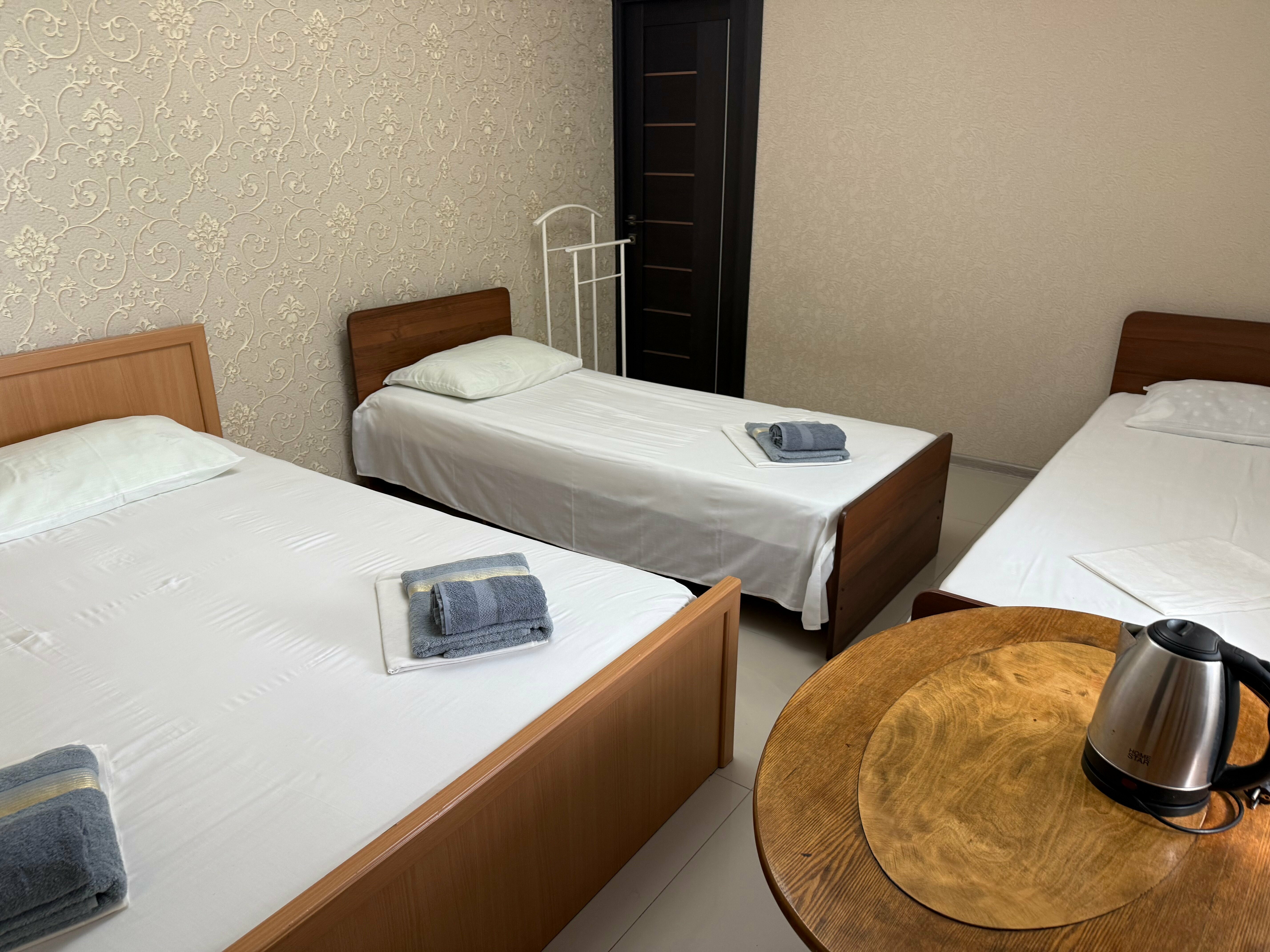 Четырехместный номер с душем