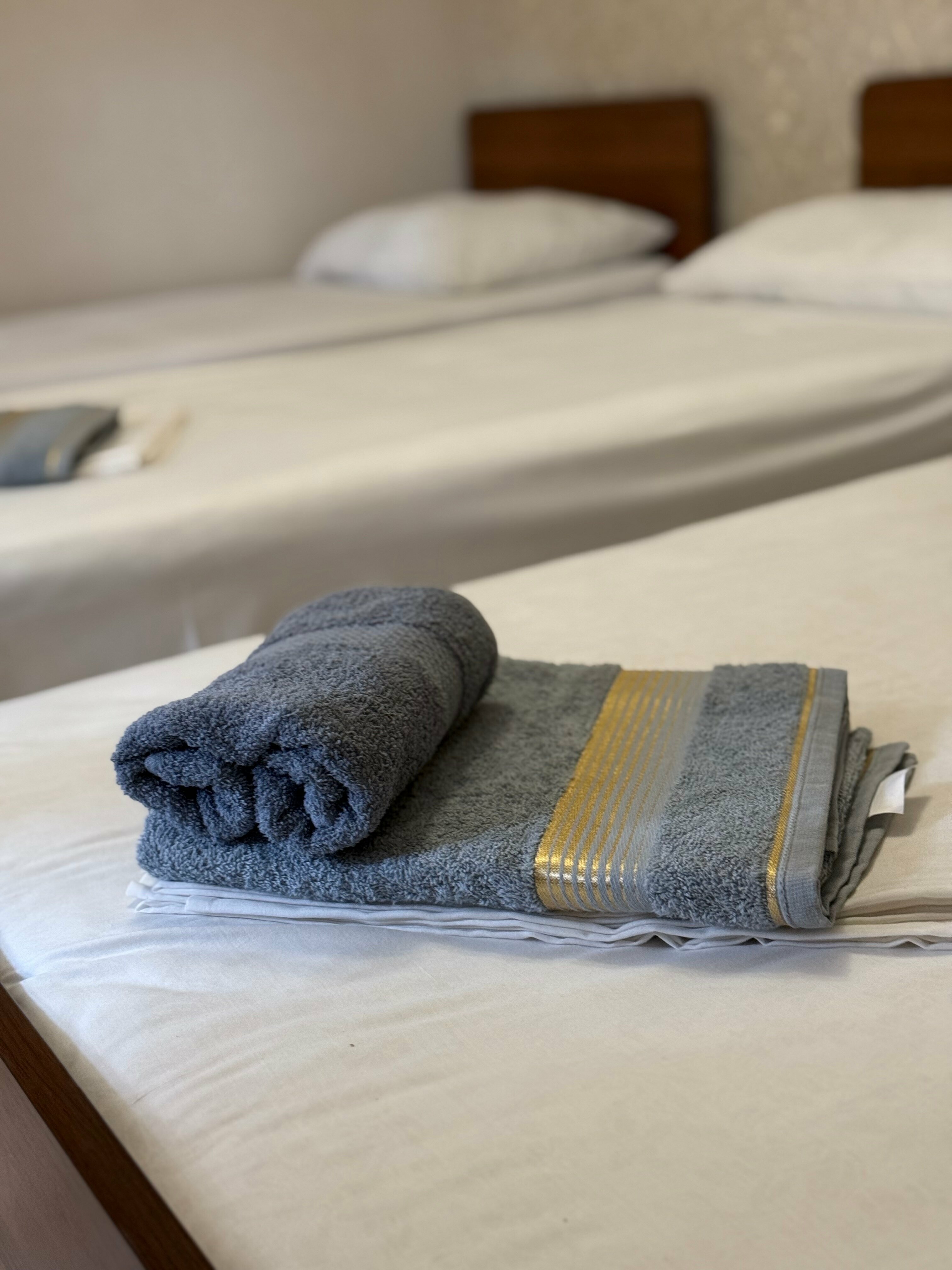 Четырехместный номер с ванной комнатой