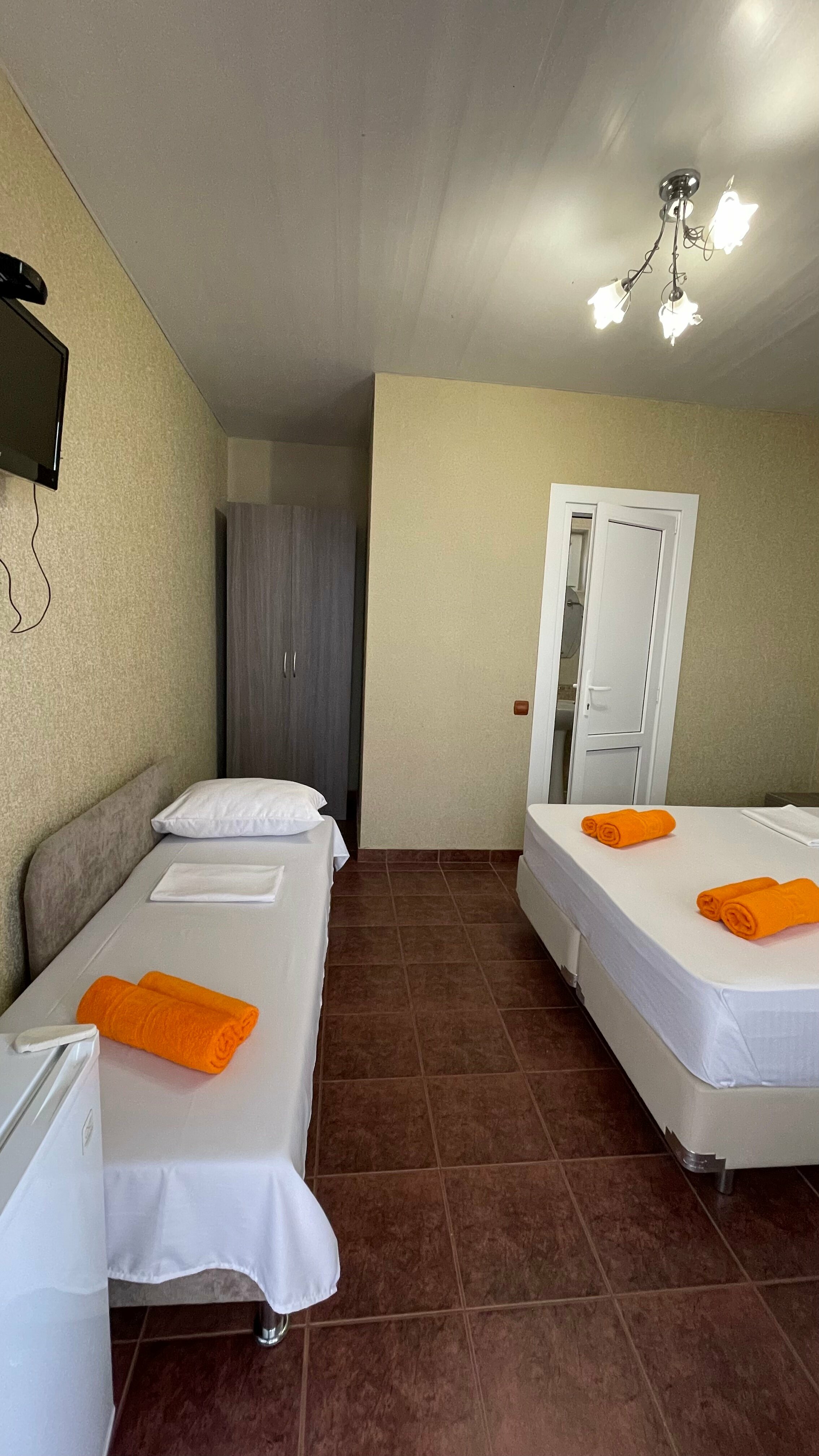 Трехместный номер с балконом