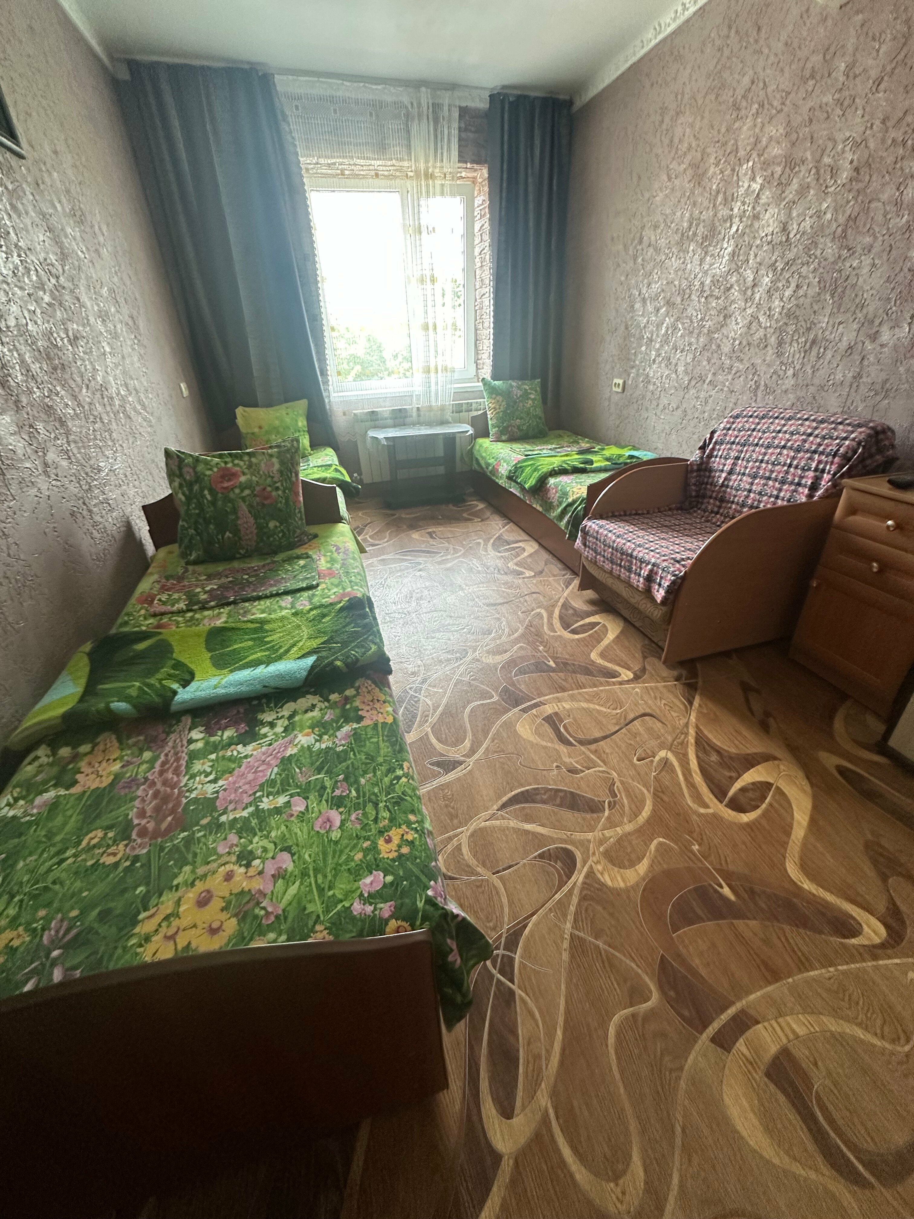 Четырехместный номер с общей ванной комнатой