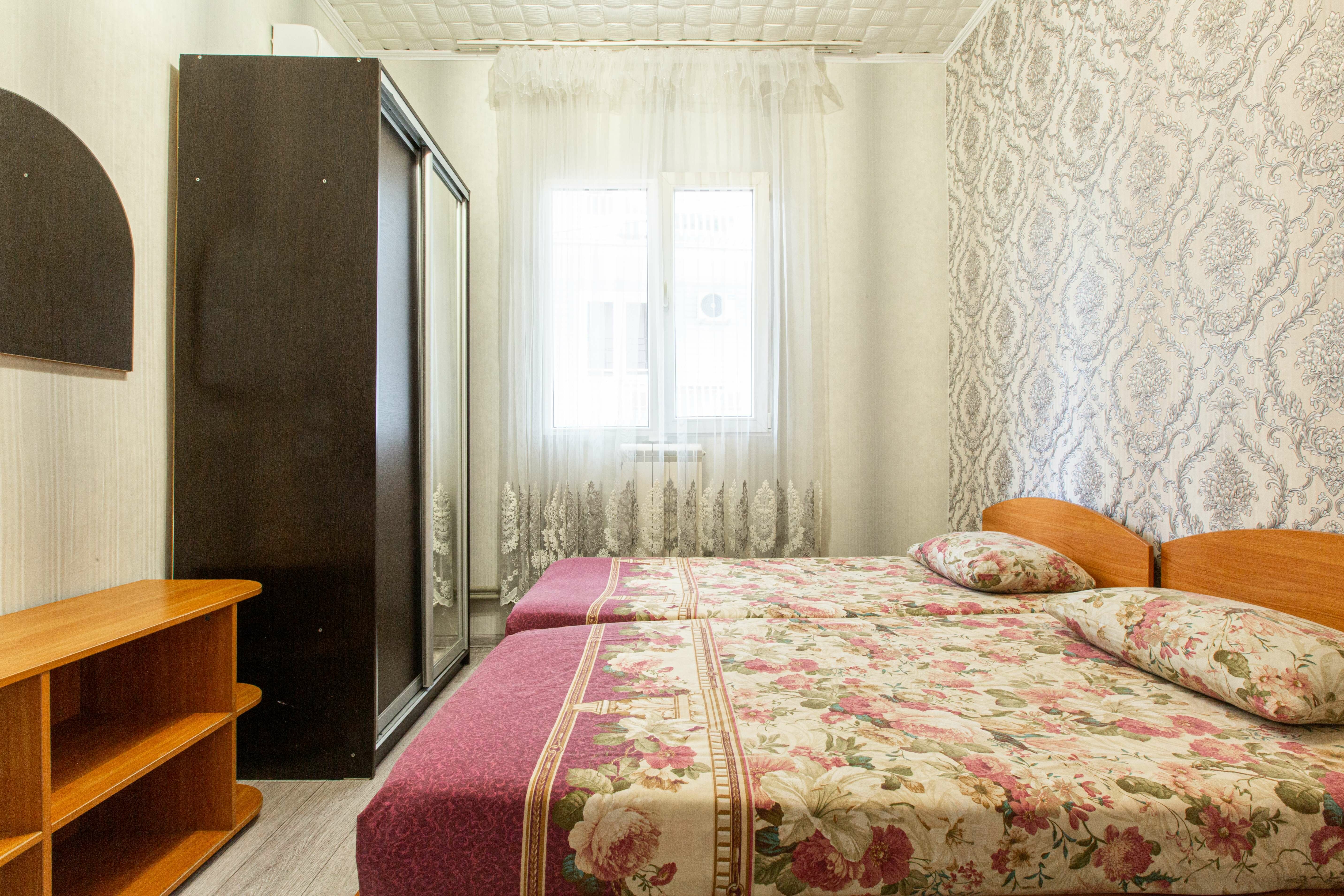 Двухместный номер эконом-класса с 2 отдельными кроватями