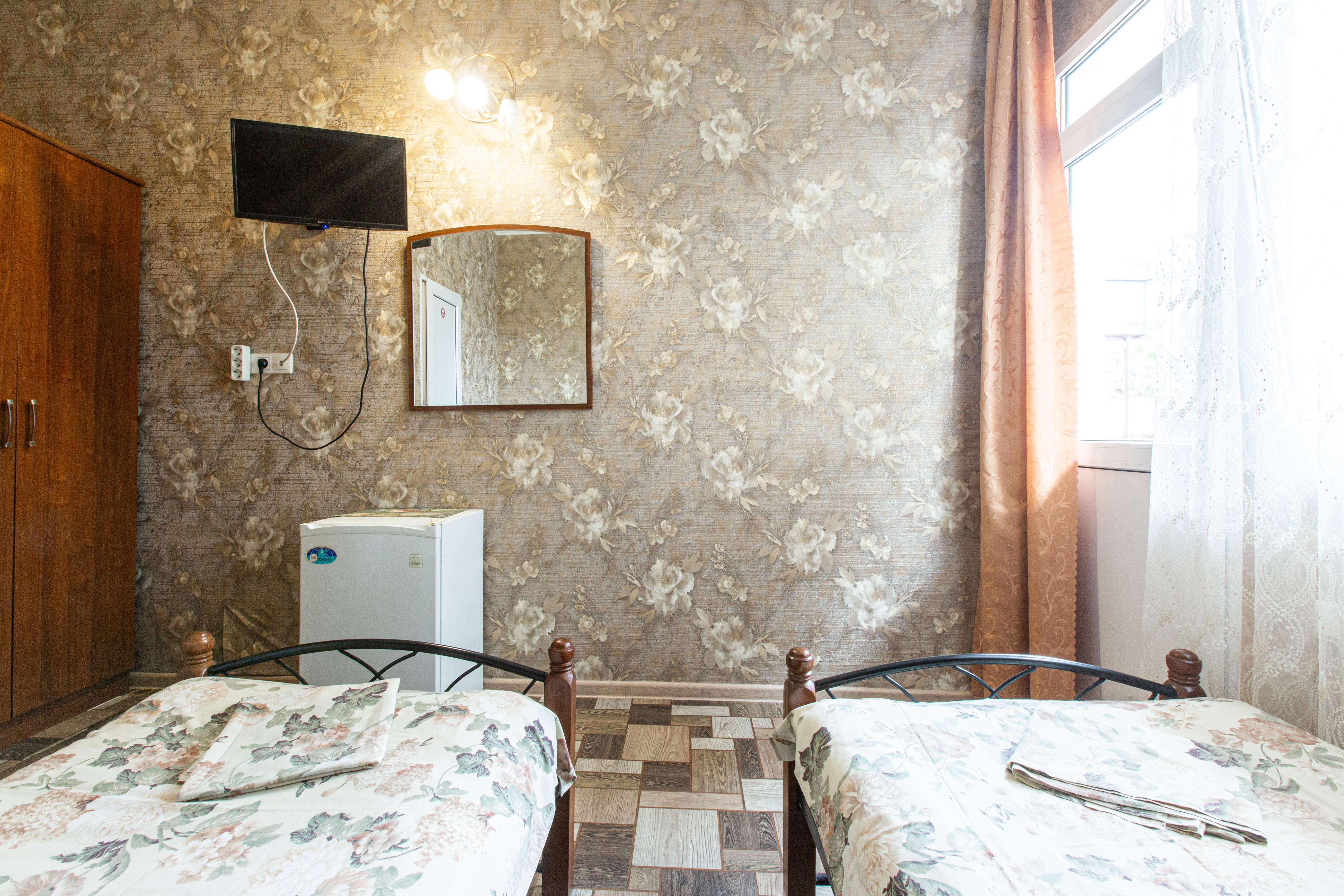 Просторный двухместный номер с 2 отдельными кроватями