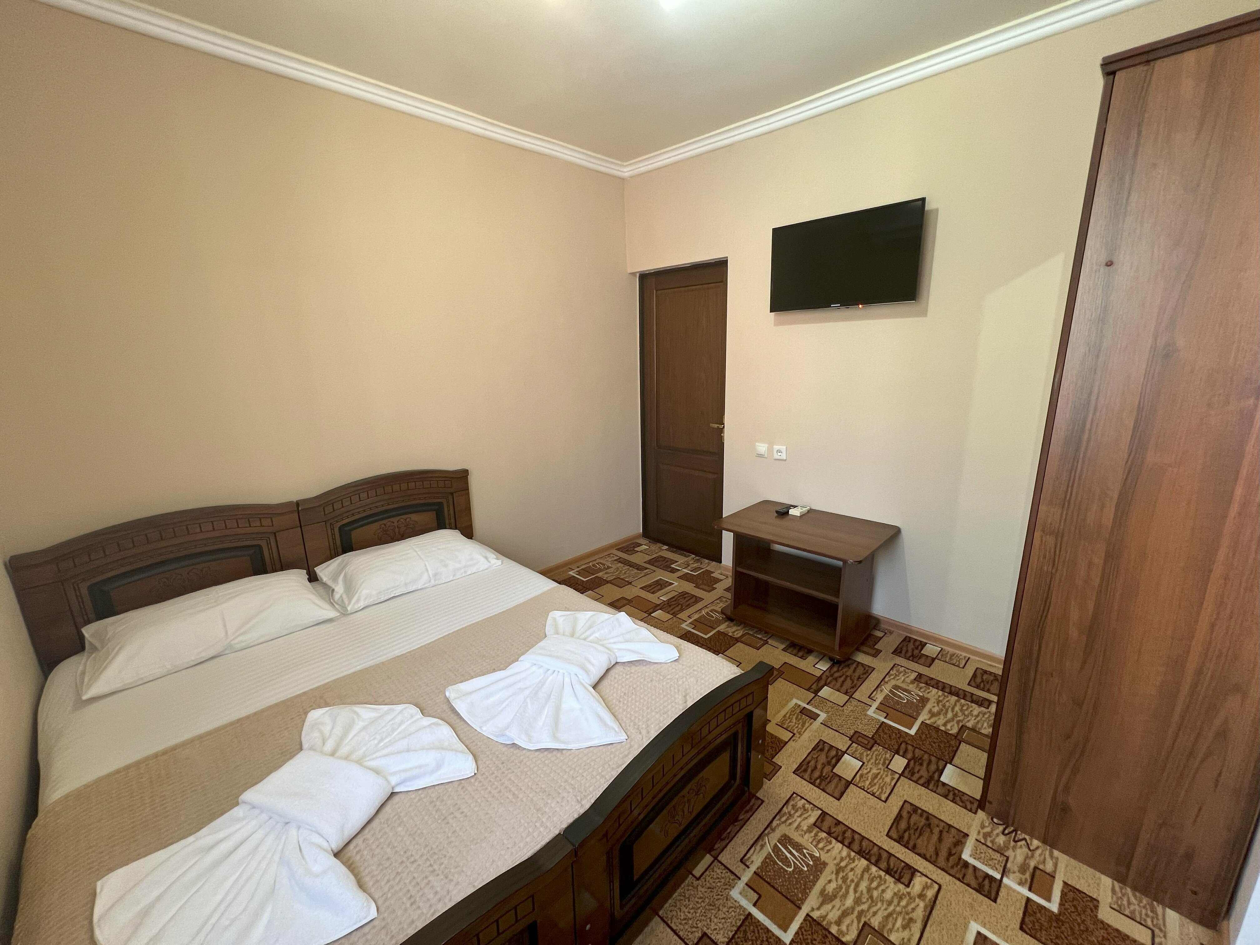 Двухкомнатный семейный номер на четыре человека