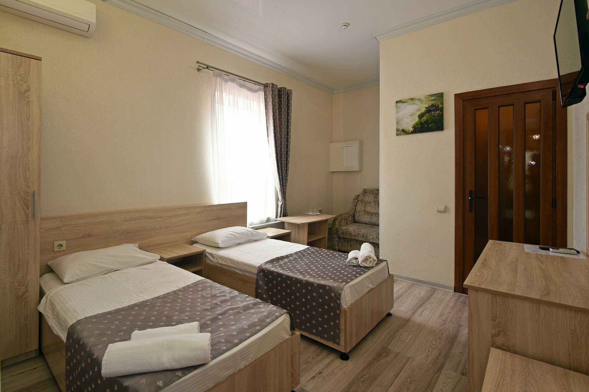 Улучшенный трехместный номер