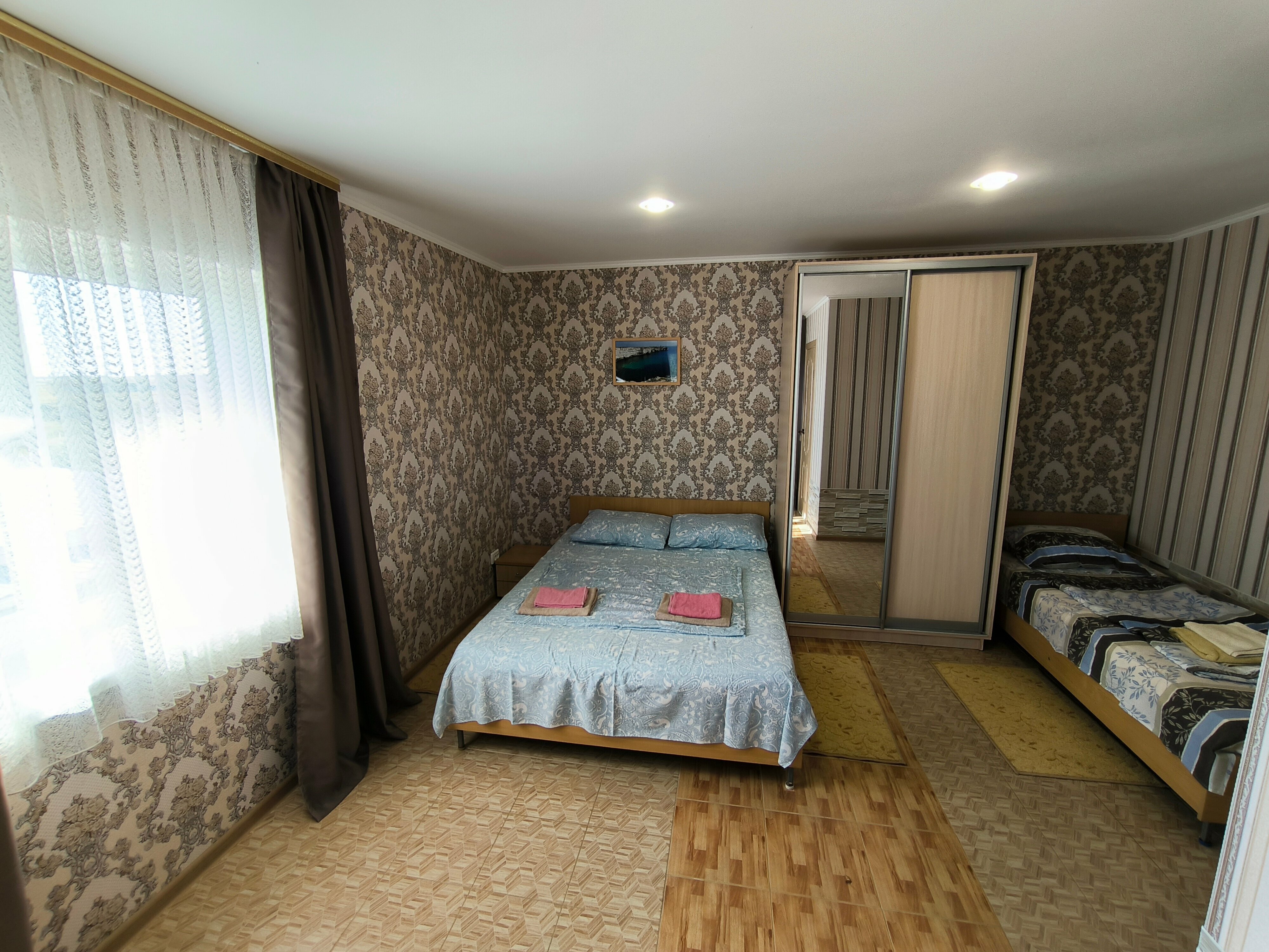 Трехместный номер с балконом