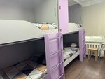 Кровать в общем 8-местном номере в Как Дома
