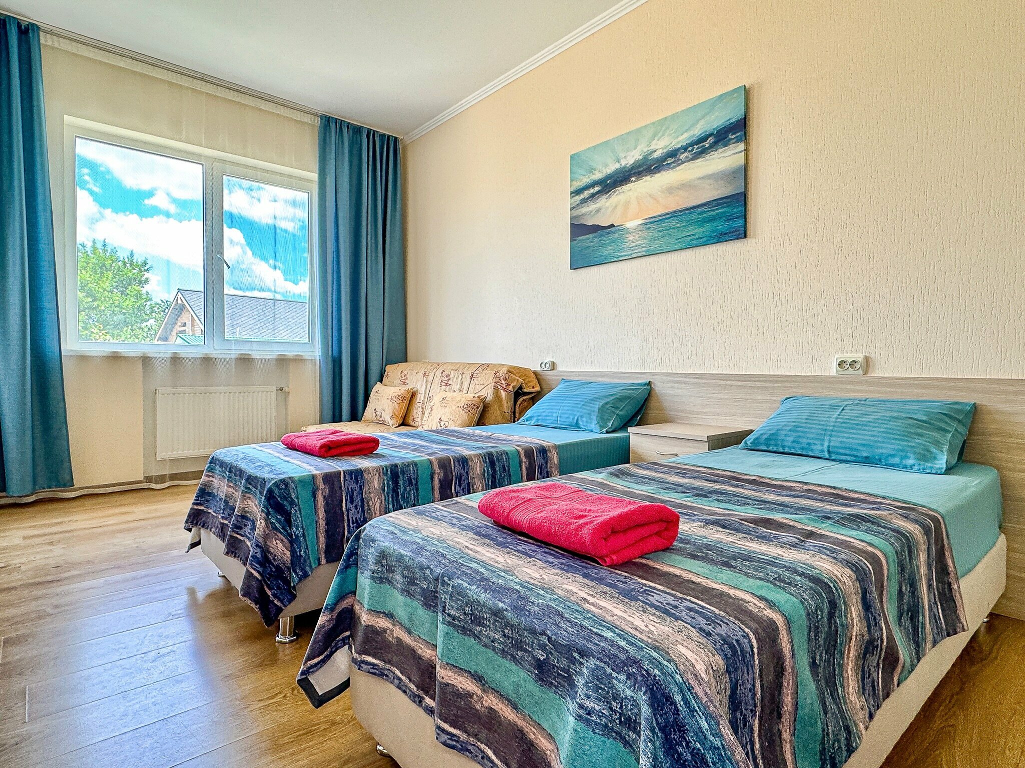 Двухместный номер с 1 кроватью или 2 отдельными кроватями и дополнительной кроватью