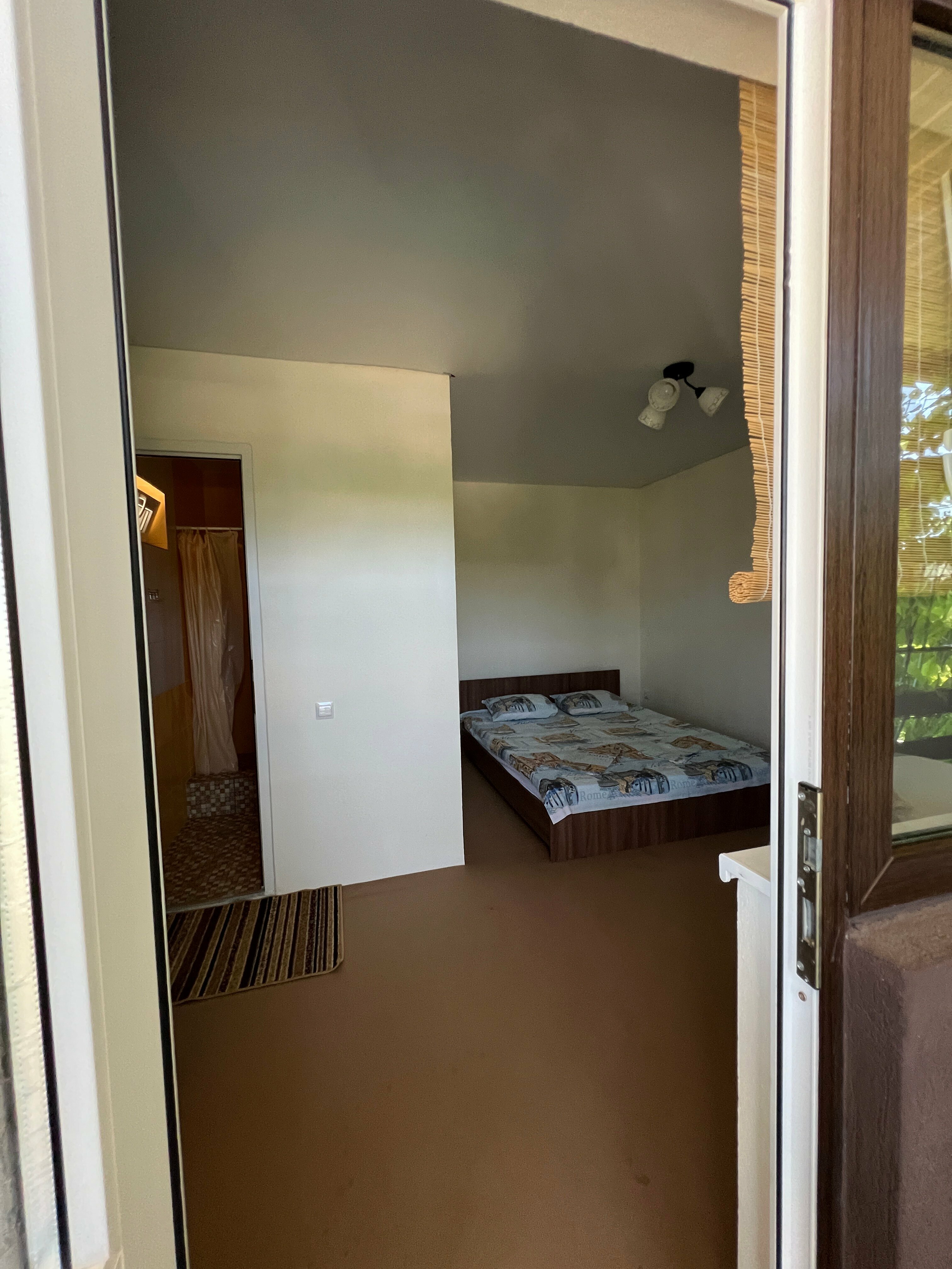 Двухместный номер с 1 кроватью, балконом и видом на горы.