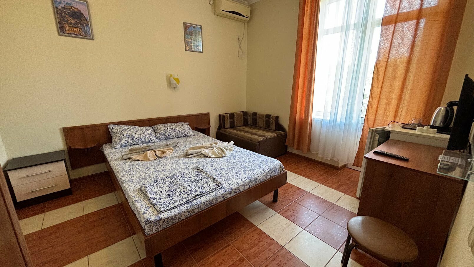 Трехместный номер с балконом